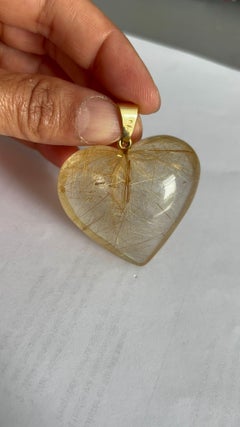 BINDER 18k gold heart-shaped pendant of rock crystal with rutile inclusions