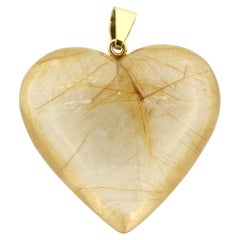 BINDER 18k gold heart-shaped pendant of rock crystal with rutile inclusions