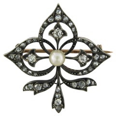 Fleur-de-lis brooch with a pearl, Old Mine and rose cut diamond 18k gold, silver