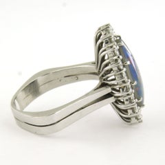 Carl F. Bucherer ring with opal and brilliant cut diamonds up to 1.50ct 18k gold