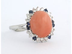 Ring with coral, sapphire and brilliant cut diamonds up to 0.40ct 18k gold