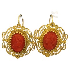 VICTORIAN 14k gold earrings set with oval-cut coral cameos – 5.5 grams