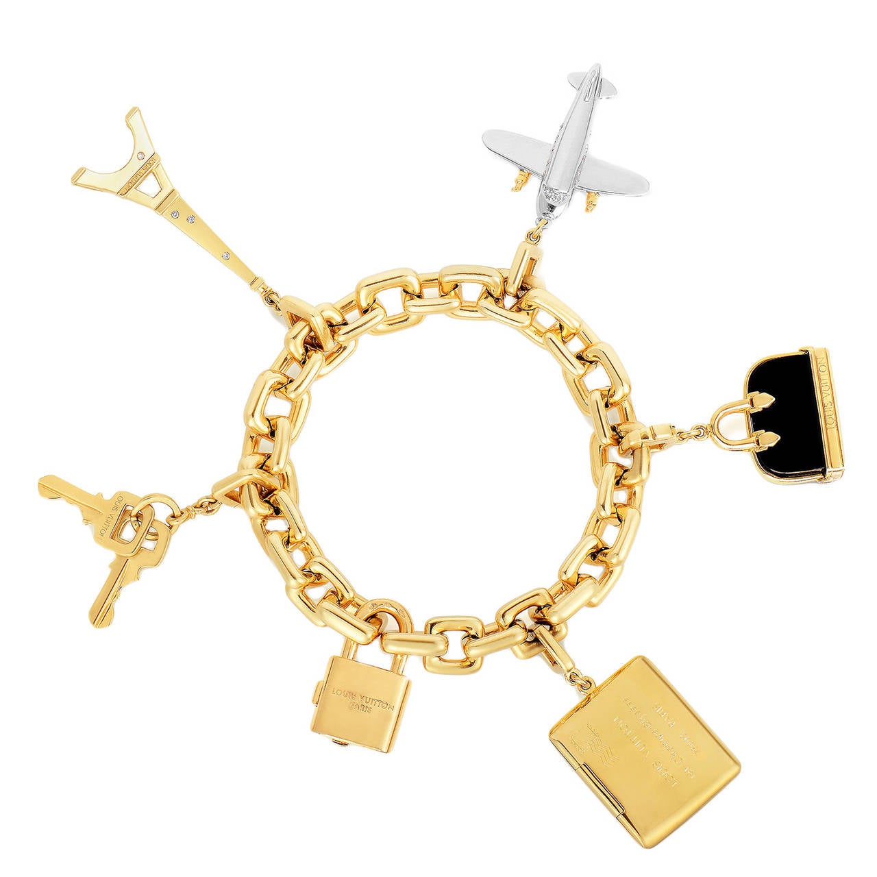 Louis Vuitton A Trip to Paris Gold Charm Bracelet For Sale at