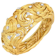 Gold "Swirl" Bangle with Diamond Accents