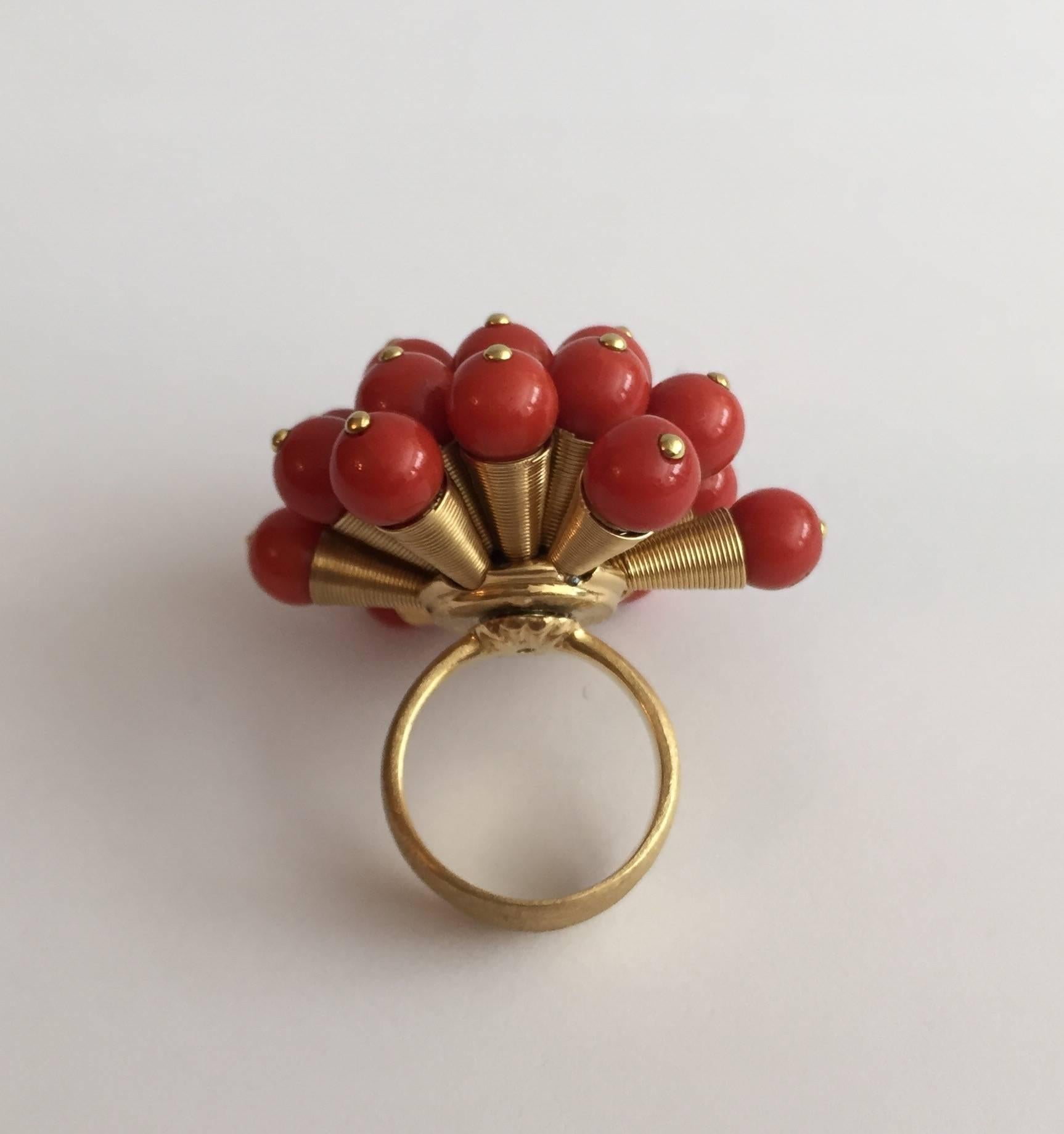 Lorredo Italian Coral and 18kt  Bubble Ring swirls with beautiful movement, Coral beads on individual spring loaded gold pegs. Size 6, sizable