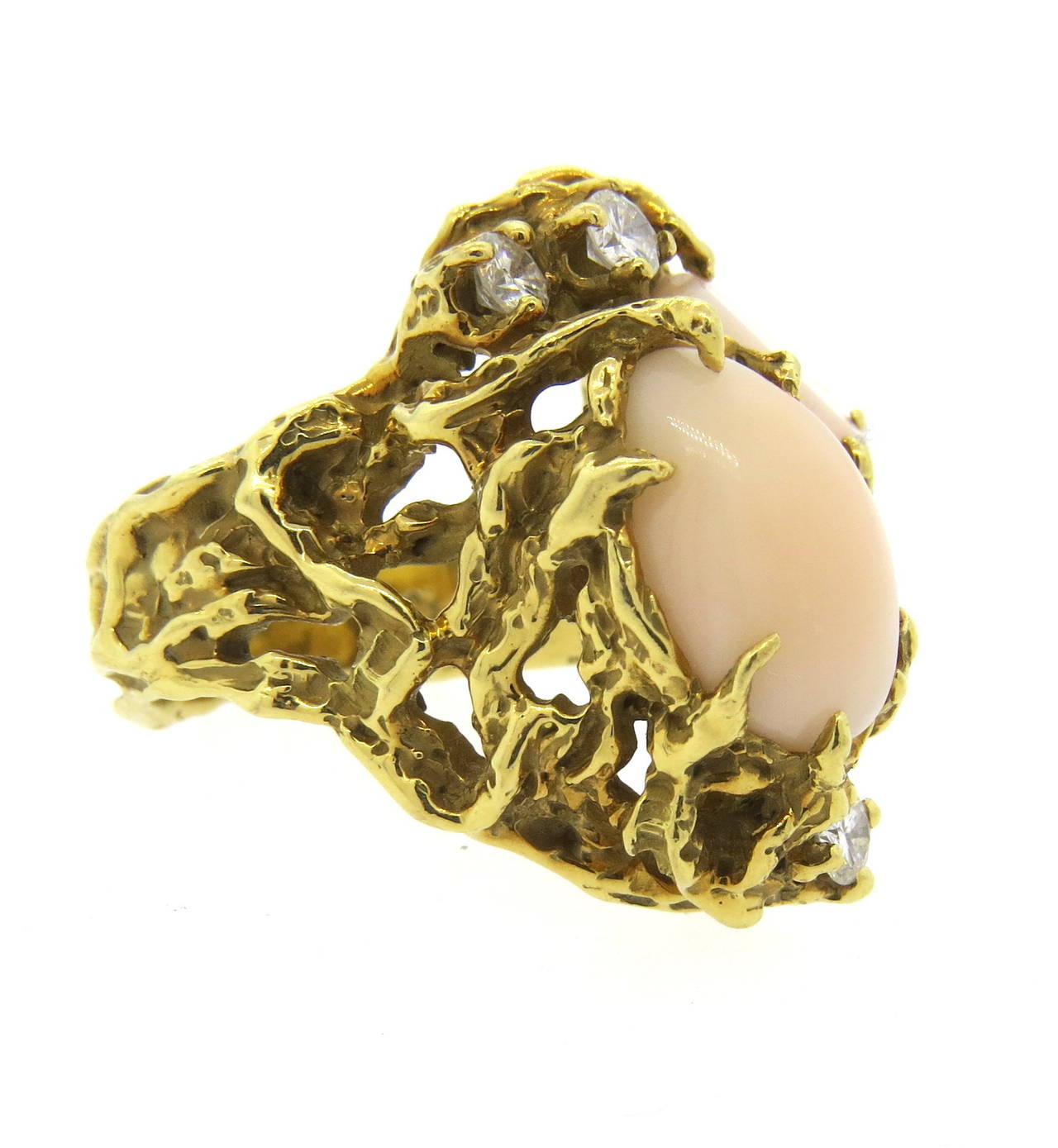 18k gold free form ring by Arthur King, featuring coral gemstones, surrounded with diamonds. Ring size 6, ring top is 25mm x 20mm. marked 18k and makers mark. weight - 17.5gr