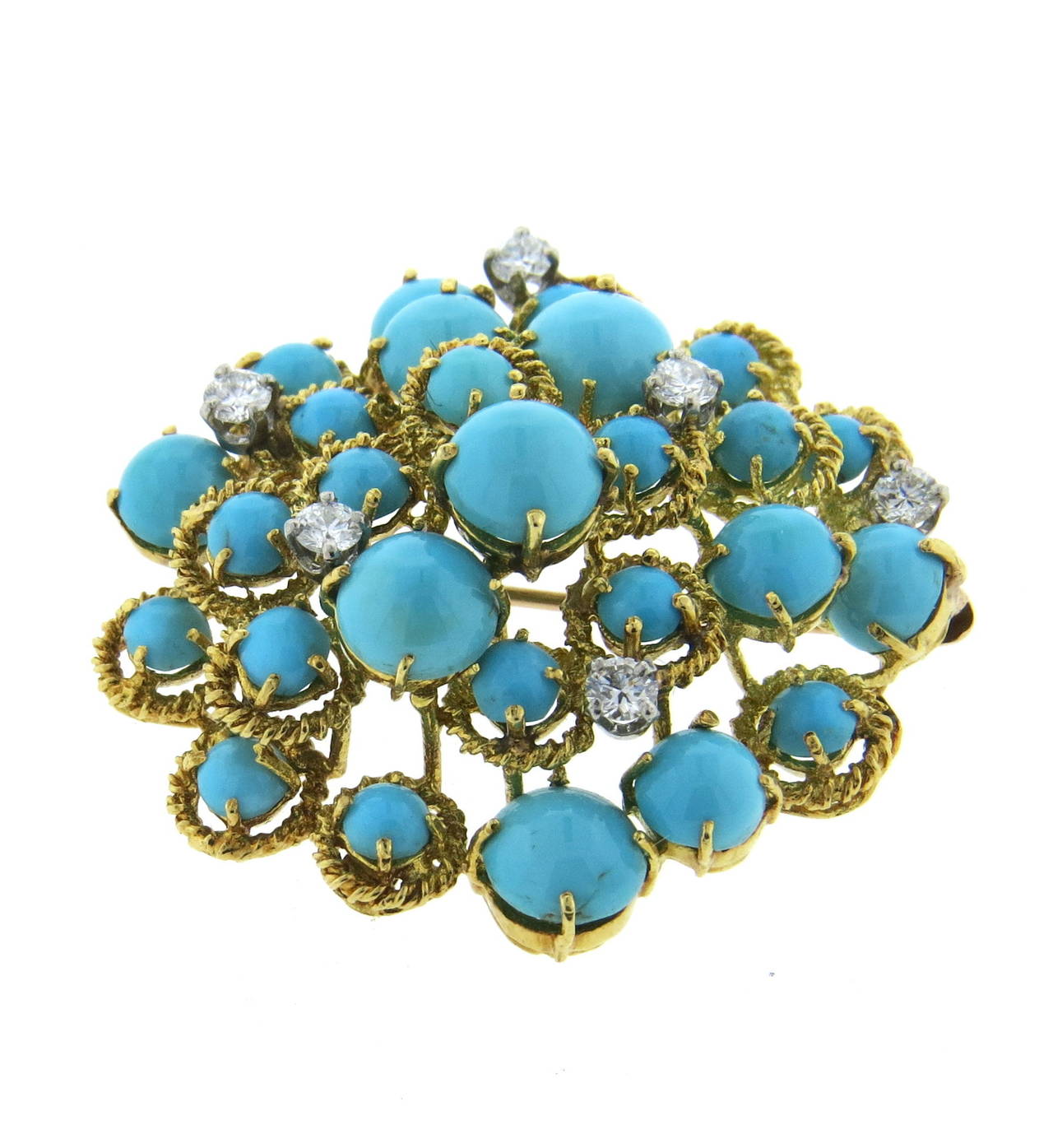 1970s brooch, set with approximately 0.50ctw in diamonds and turquoise in 18k gold.  Measures 39mm x 38mm. Weight - 16.9gr