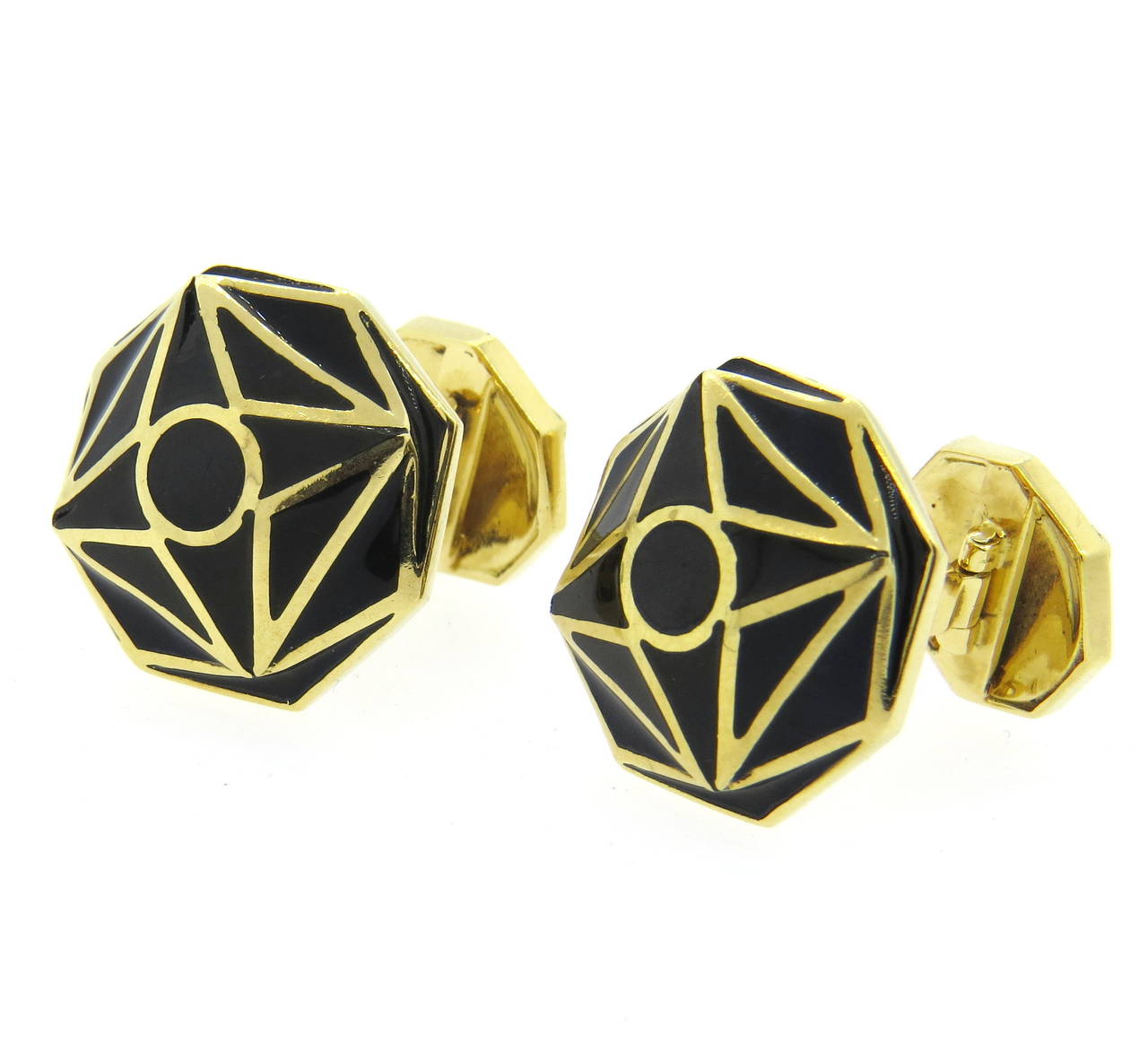 18k gold cufflinks by David Webb, decorated with black enamel ornament. Tops measure 20mm x 20mm, backs measure 14mm x 14mm. Marked Webb and 18k. weight - 24.4gr
