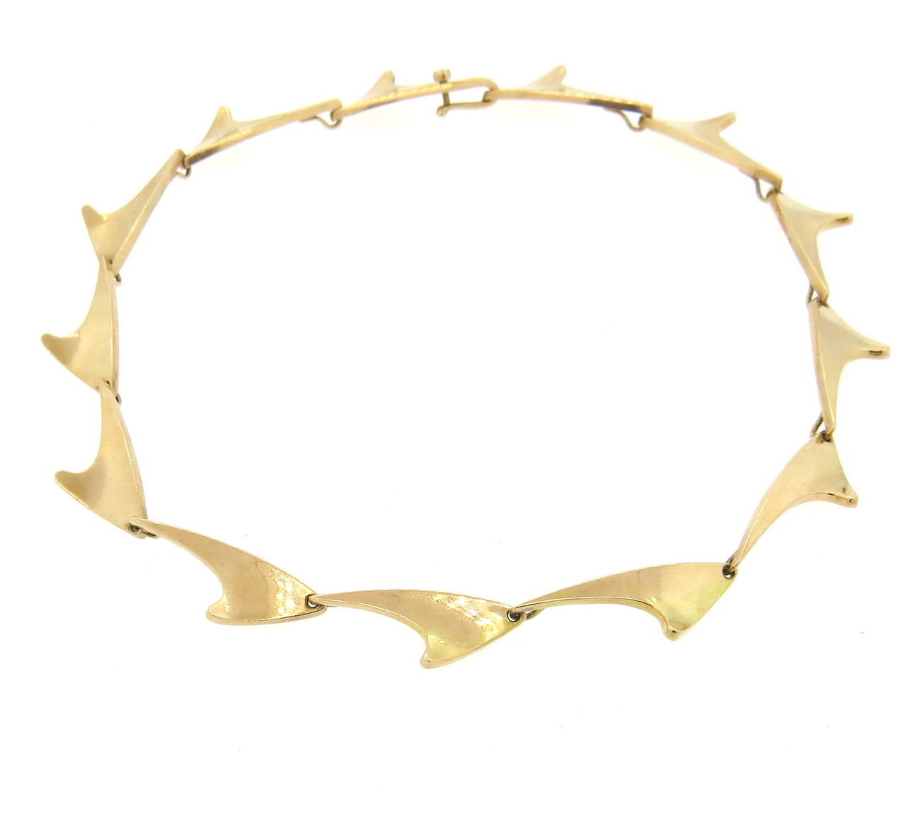 Modernist 14k gold necklace by Bent Knudsen. Measures 15