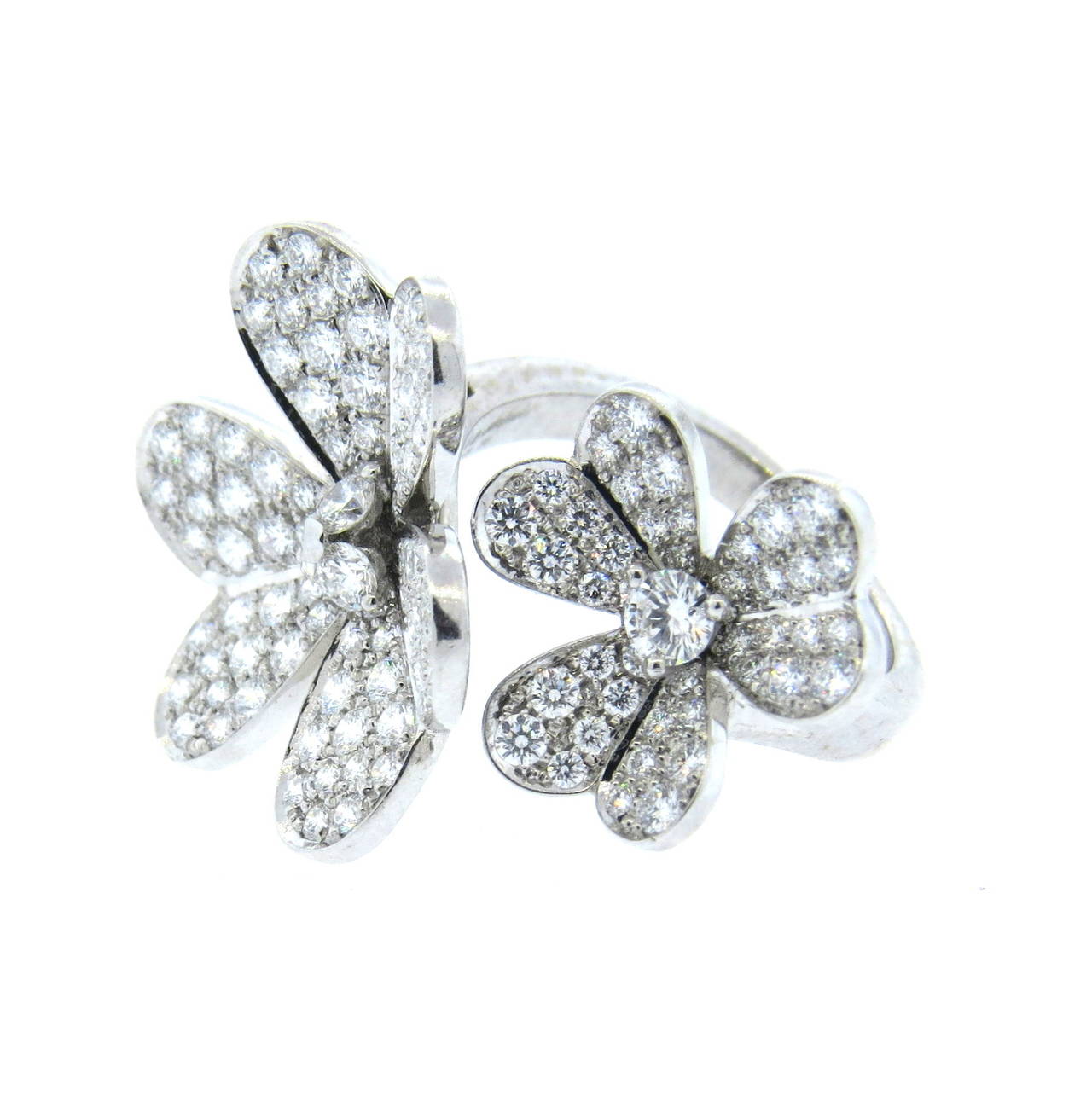 Beautiful Van Cleef & Arpels 18k white gold flower ring from Frivole collection, featuring approximately 2.25ctw in diamonds. Ring size 6, ring top is 20mm x 32mm. Marked Van Cleef & Arpels,750,BL66373,50. Weight of the piece - 8.9gr  Currently