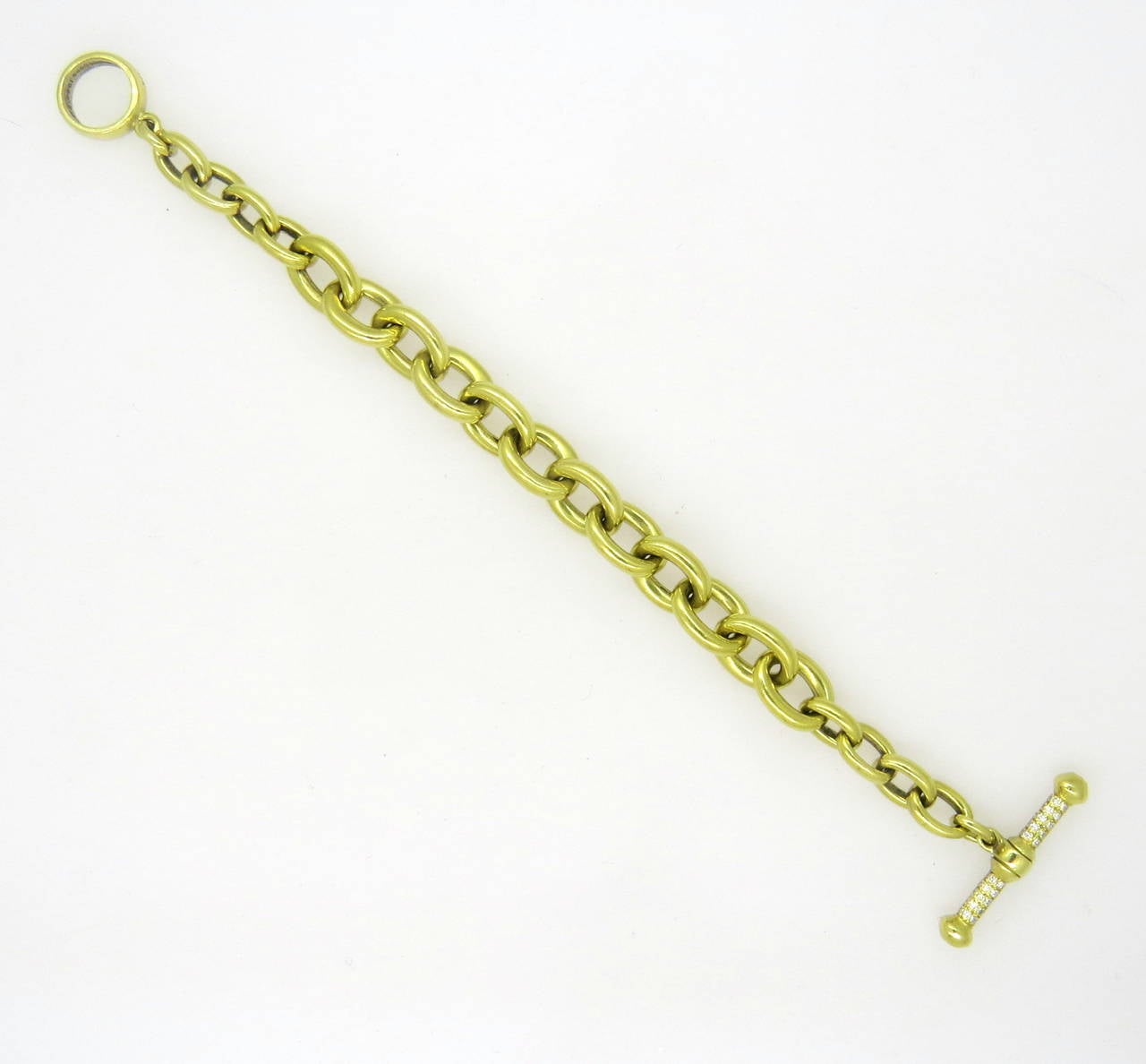 18k gold chain bracelet, featuring diamond toggle closure by Barry Kieselstein-Cord. Bracelet is 9