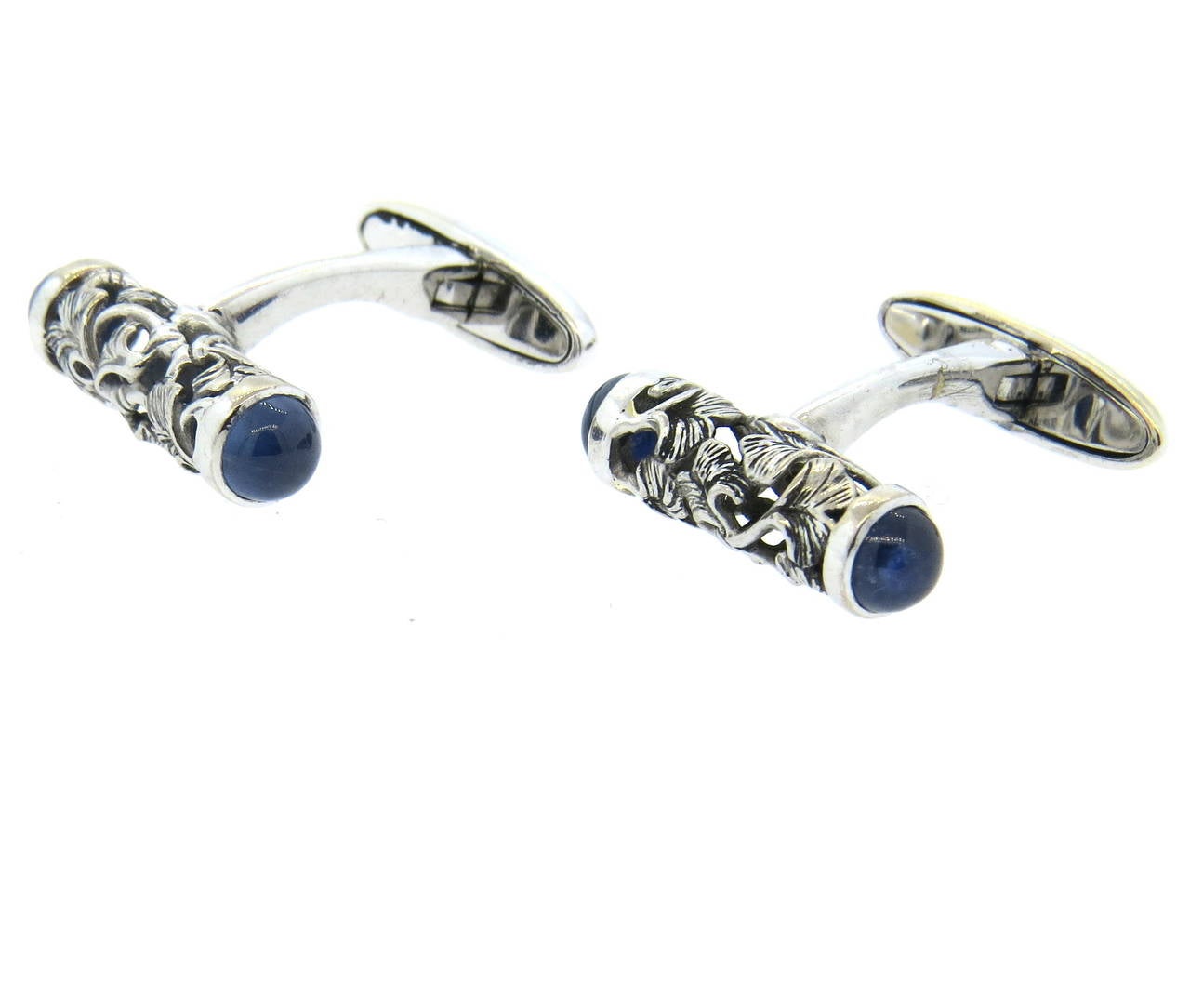 18k white gold carved cufflinks by Carrera Y Carrera with sapphire cabochons. Tops measure 20mm x 5mm. Marked with makers hallmark, serial number 423828 and 750. weight - 9.6gr