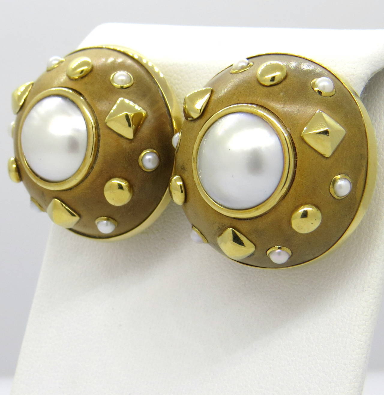 18k gold Trianon earrings, featuring wood top decorated with pearls. Earrings measure 30mm in diameter. Marked Trianon and 750. weight - 28.6gr