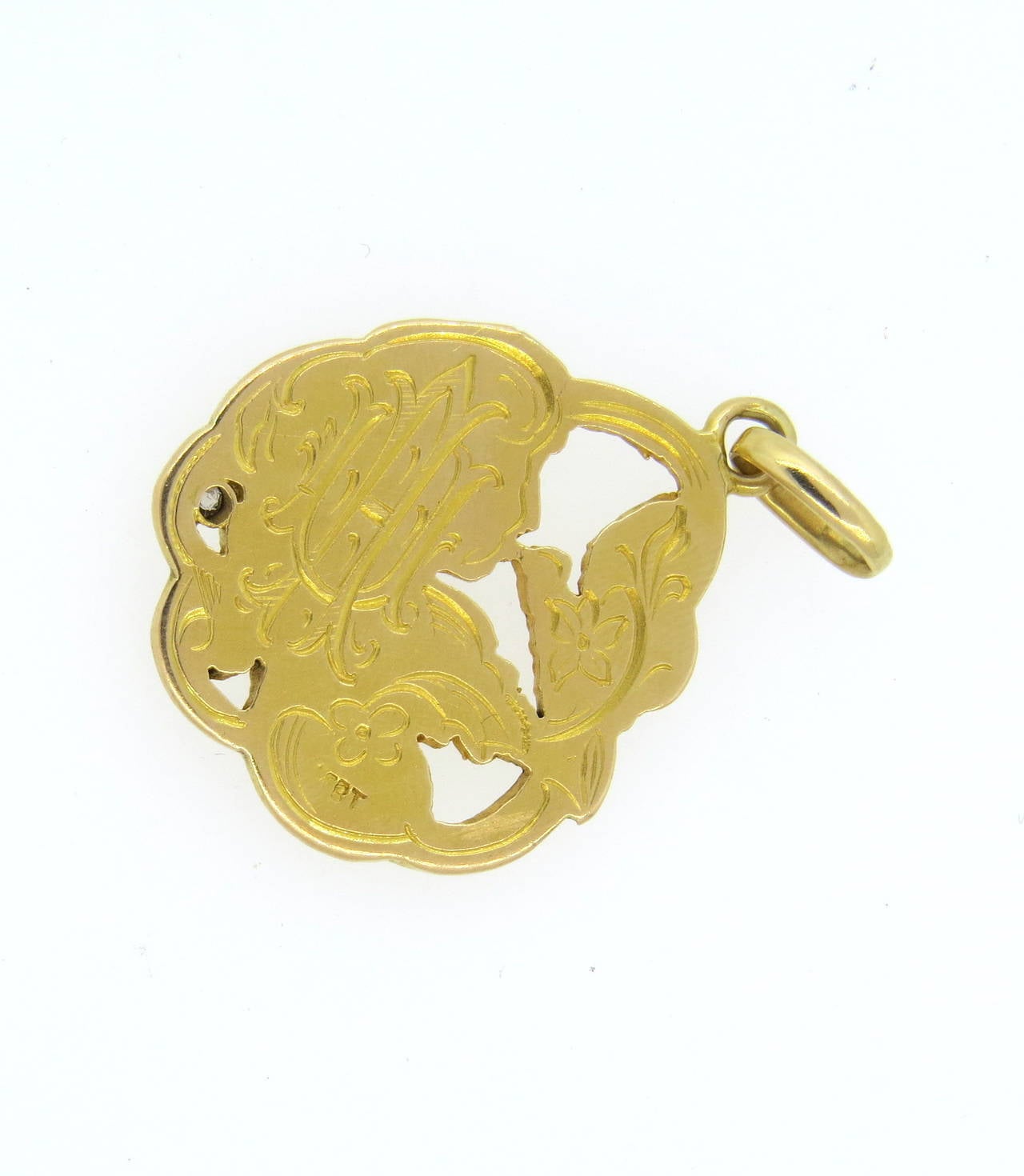 Art Nouveau 18k gold pendant decorated with diamond. Pendant measures - 41mm x 26mm. Weight of the piece - 13.5 grams