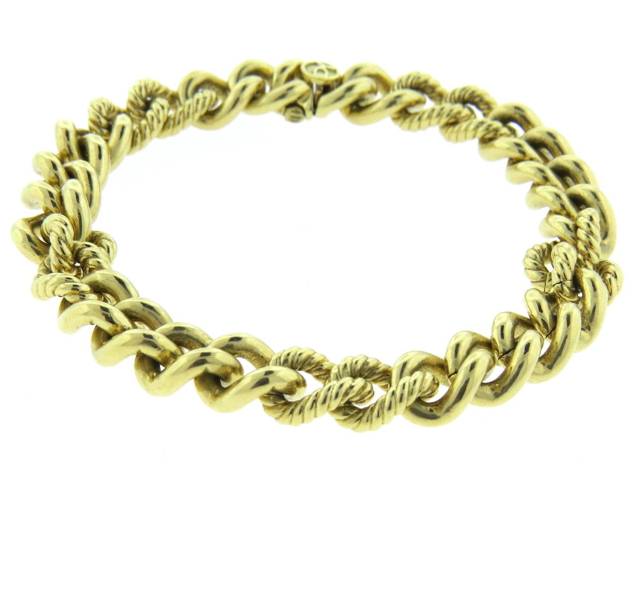 An 18k yellow gold chain link bracelet.  Crafted by David Yurman, the bracelet measures 8.5