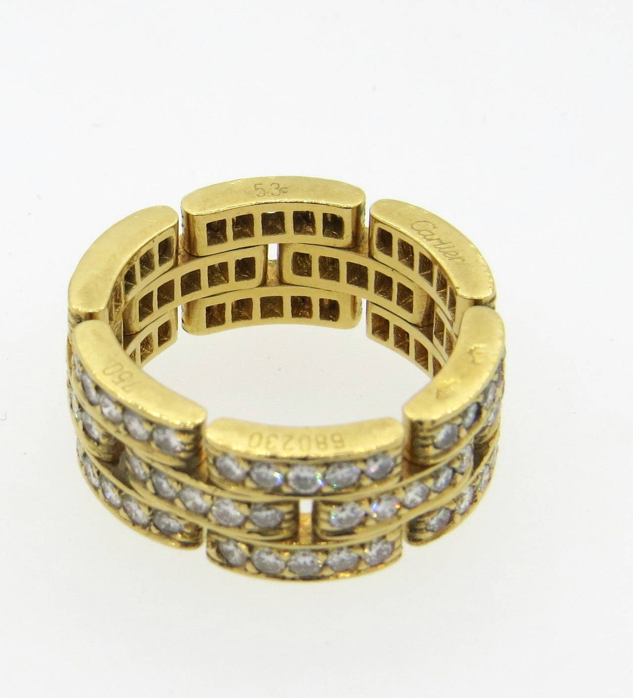 An 18k yellow gold ring set with approximately 1.40cts in G/VS diamonds.  Crafted by Cartier for there Maillon Panthere collection, the ring is a size 6 and weighs 10.5 grams.  The ring is currently retailed by Cartier for $14700 plus tax.  Marked: