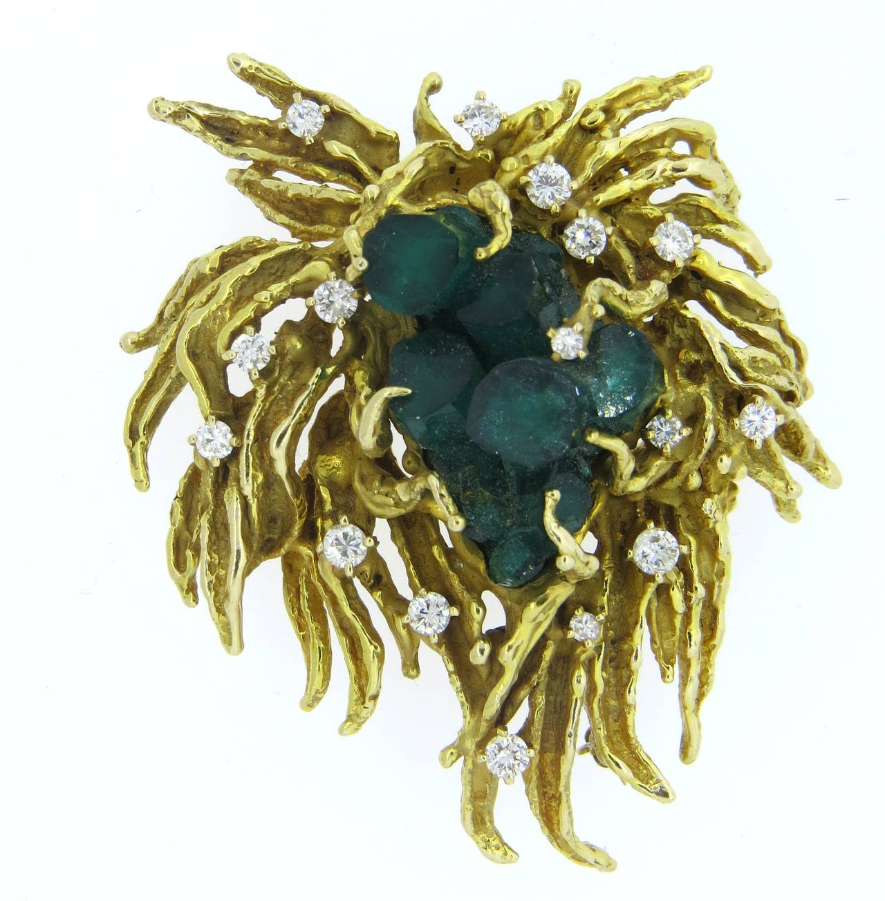 Large 14k gold brooch, set with Chatham emeralds and approx. 0.75ctw in diamonds. Brooch measures 56mm x 45mm. Weight of the piece - 43.5 grams