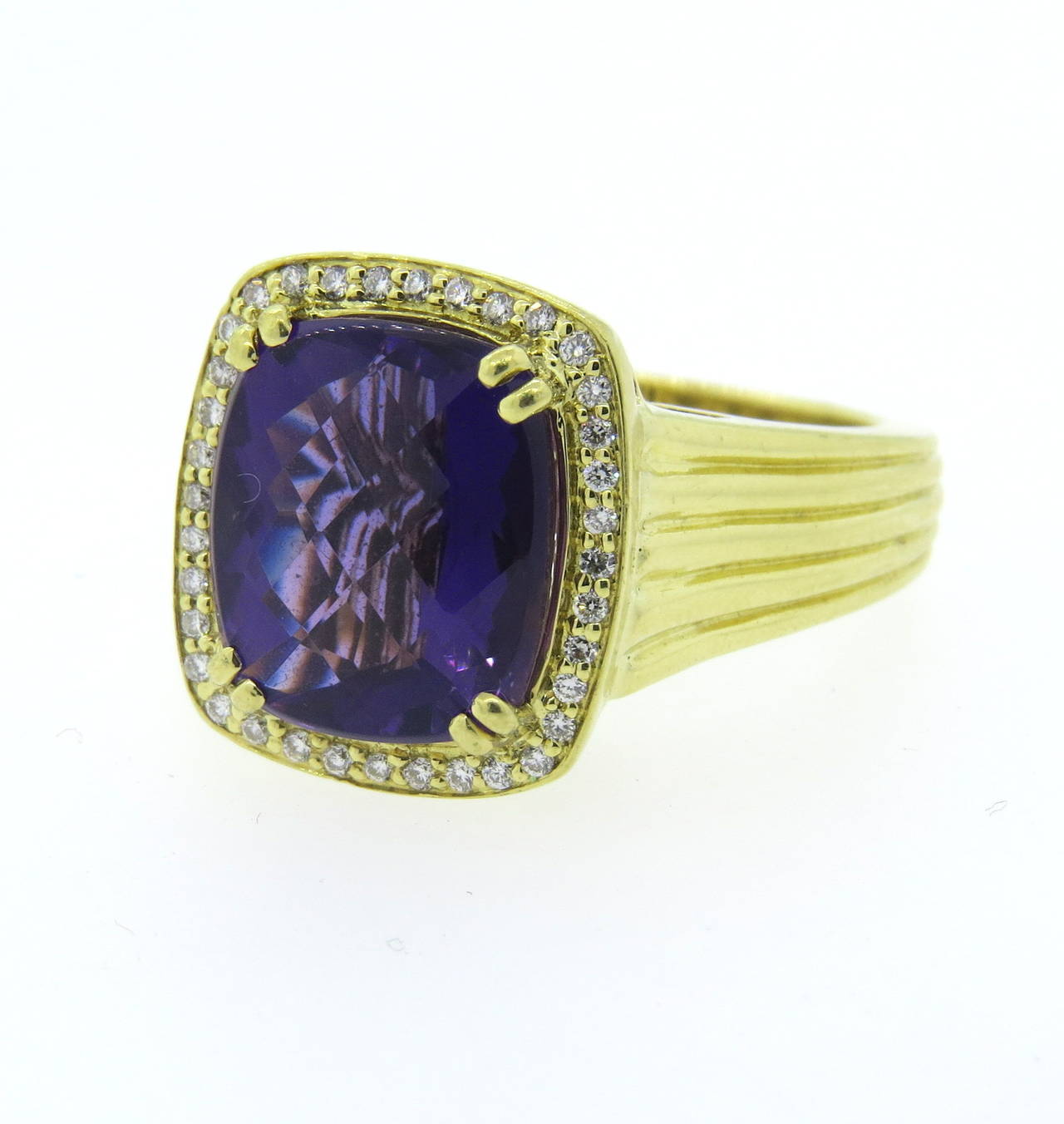18k gold ring by Charles Krypell, featuring 13.86mm x 11.95mm amethyst, surrounded with approx. 0.38ctw in diamonds. Ring is a size 10, ring top is 18mm x 16mm. Marked Krypell,18k. Weight of the piece - 18.3 grams