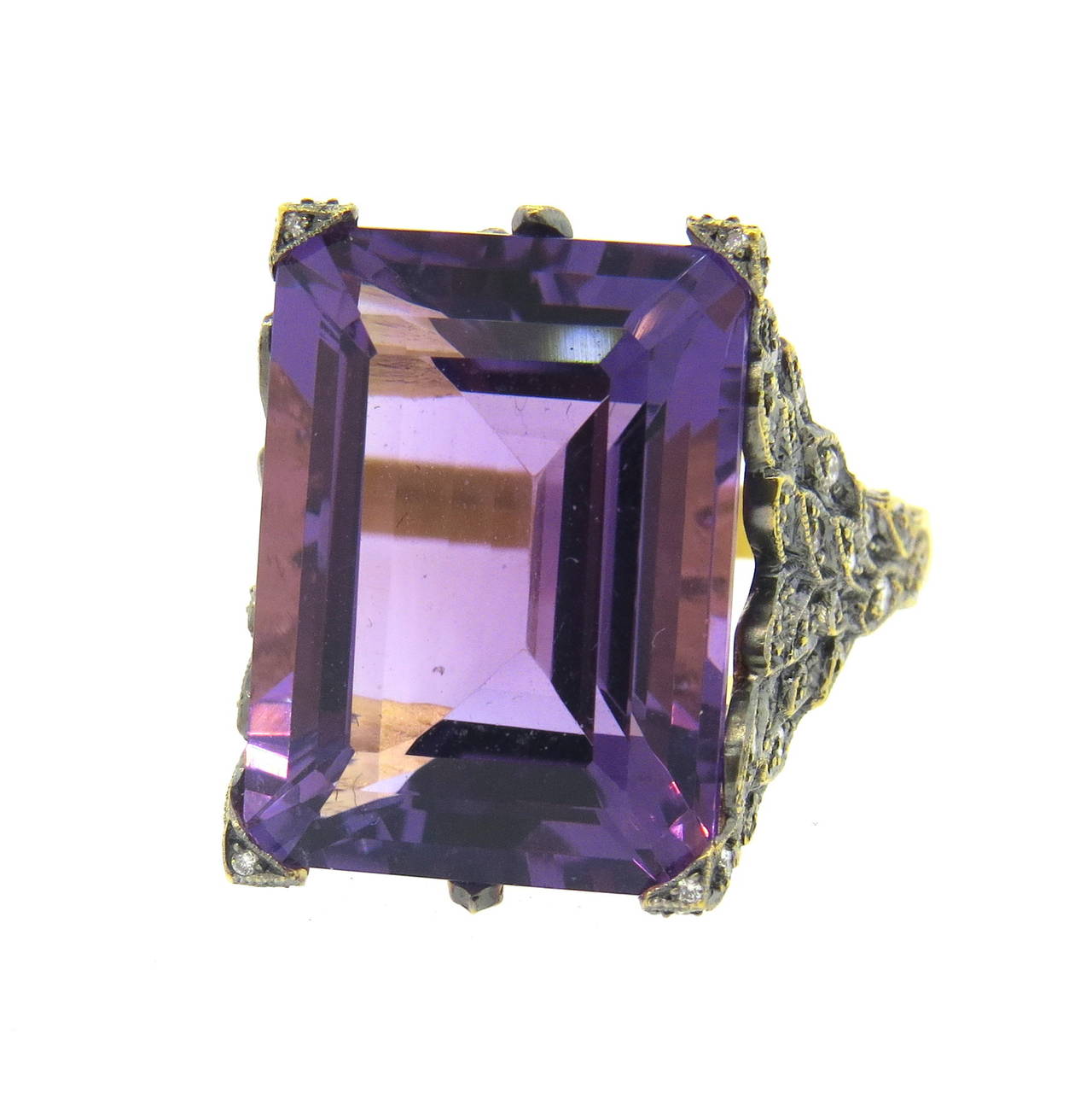22k gold Cathy Waterman ring from Peacock collection, set with approx. 20ct amethyst, surrounded with diamonds. Ring size 8 3/4, ring top is 21mm x 15mm. Marked with maker's mark and 22k. Weight of the piece - 14.7 grams