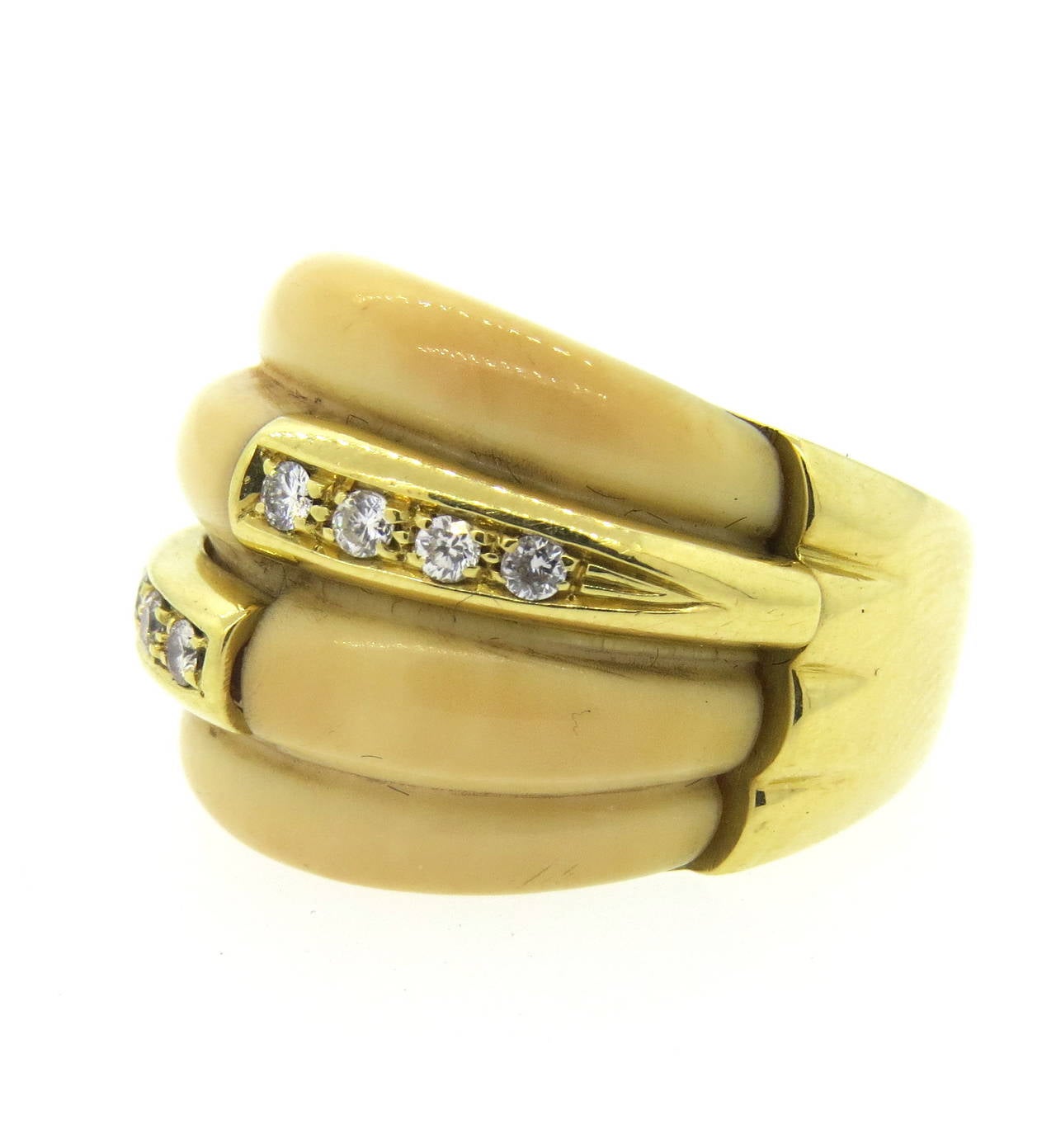 Circa 1970s 18k gold ring by H Stern, featuring approx. 0.16ctw in diamonds and bone. Ring size is 7, ring top is 19mm at widest point. Marked 18kt and S hallmark. Weight - 14.6 grams