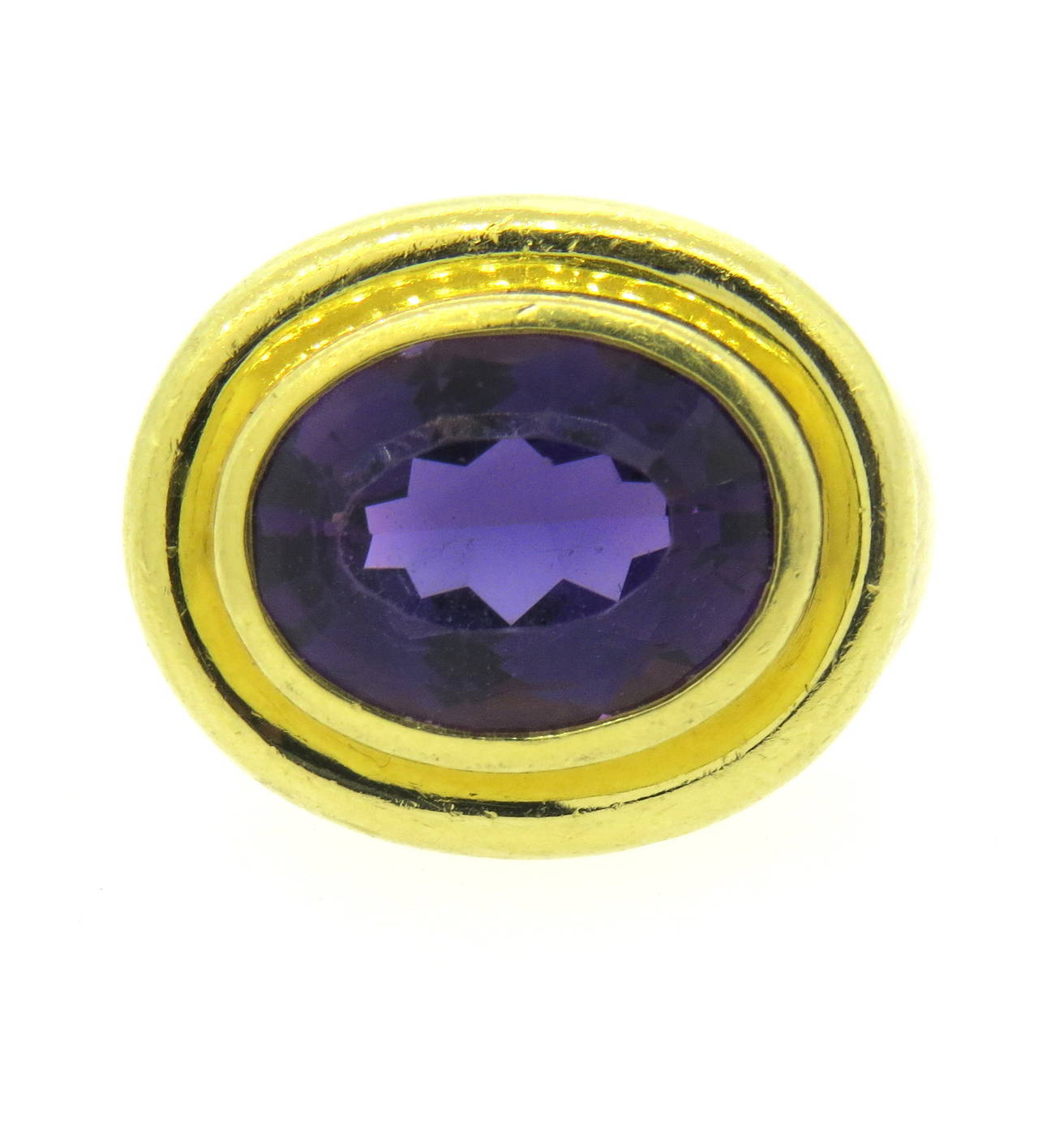 Tiffany & Co 18k gold ring by Paloma Picasso, featuring large oval amethyst gemstone. Ring size 10, ring top is 19mm x 22mm. Marked Paloma Picasso,Tiffany & Co,18k. Weight - 22.3 grams