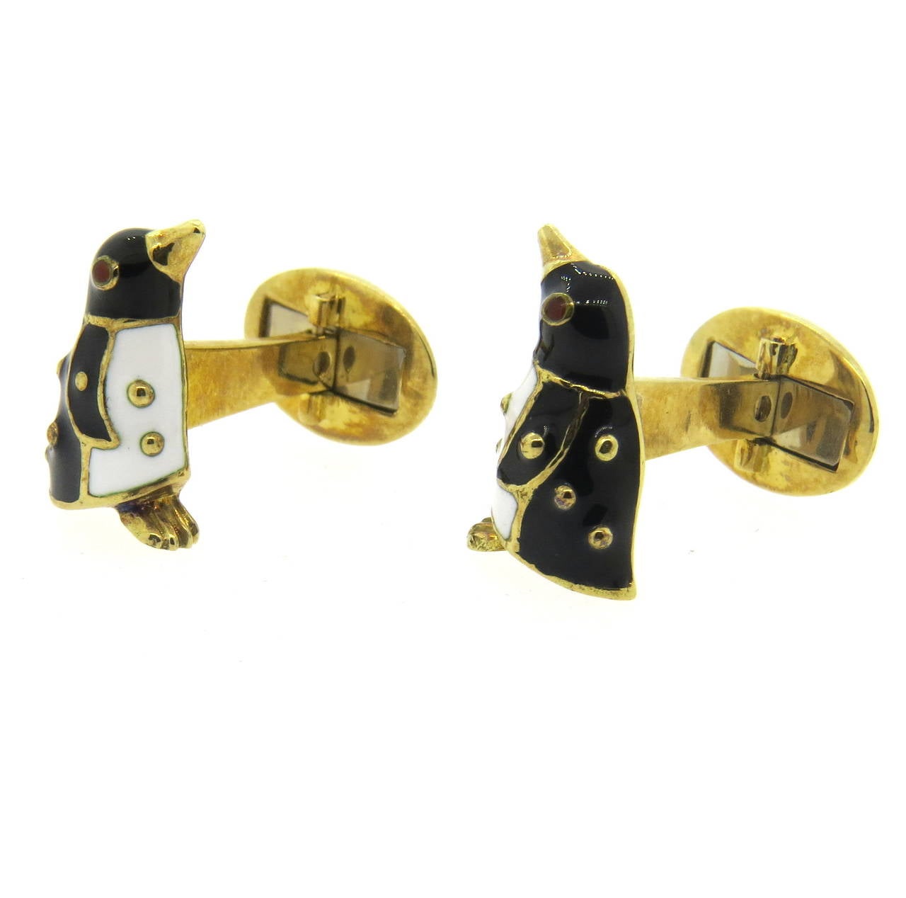 18k gold cufflinks by Hidalgo, featuring enamel penguin design. Tops measure 18mm x 11mm. Marked 750 and Hidalgo. Weight - 14.4 grams