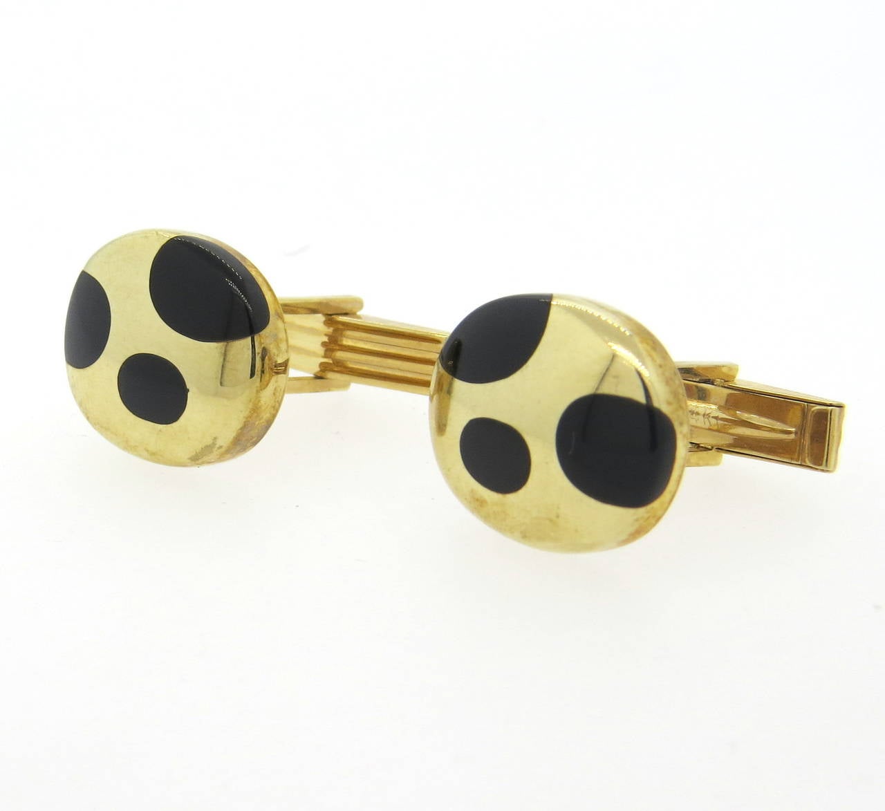 14k gold cufflinks with onyx inlay, measuring 20mm x 16mm. Weight - 13.3 grams