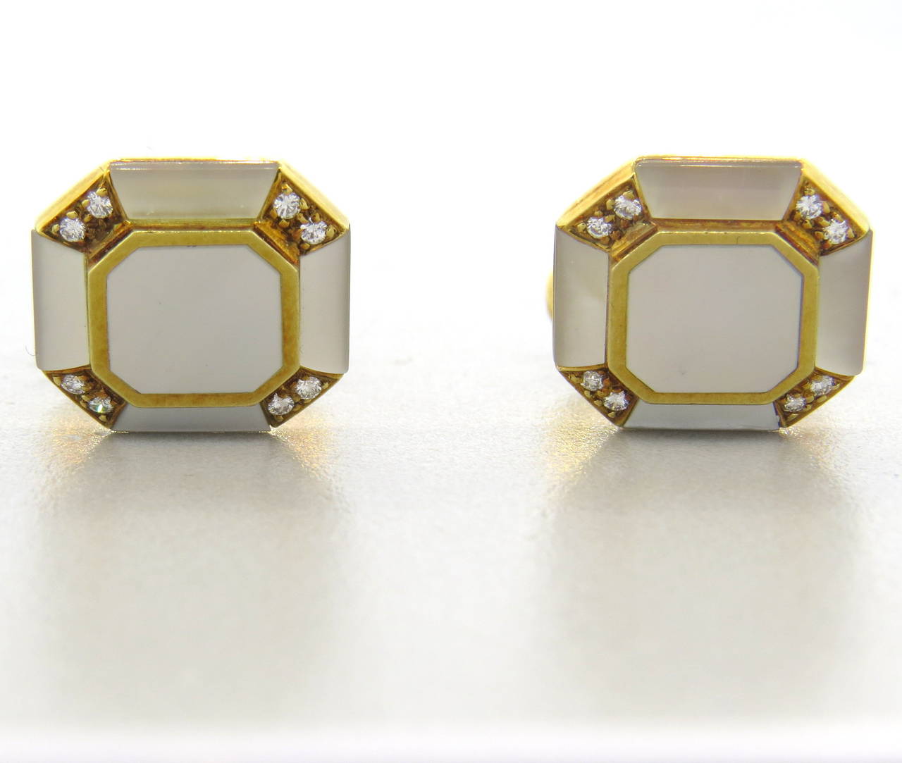 18k gold classic cufflinks, set with diamonds and mother of pearl top. Measuring 15mm x 15mm. Weight - 16.3 grams