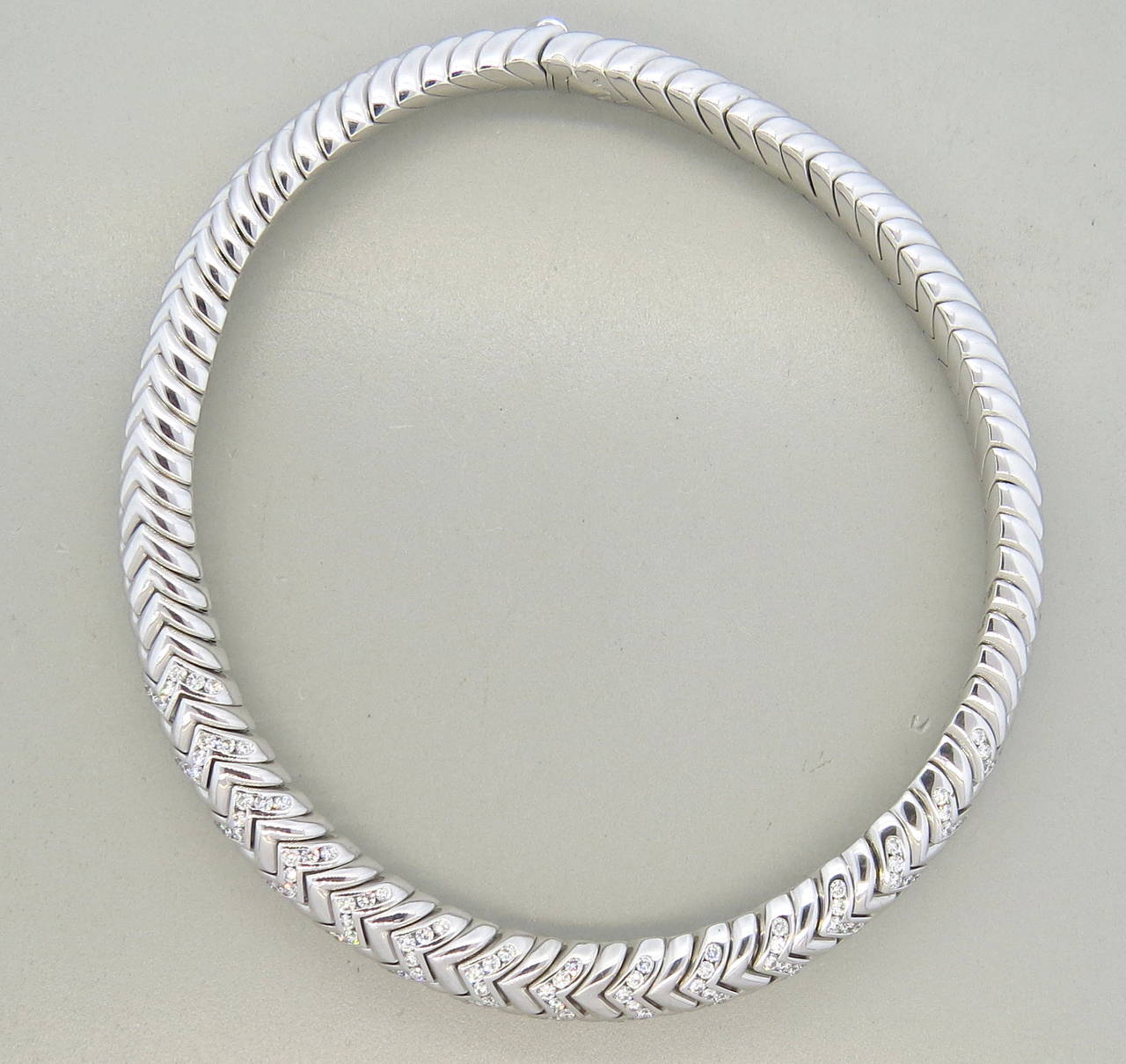 18k White gold necklace by Bulgari from iconic Spiga collection,featuring approx. 10.50ctw in diamonds.

 Necklace is 16
