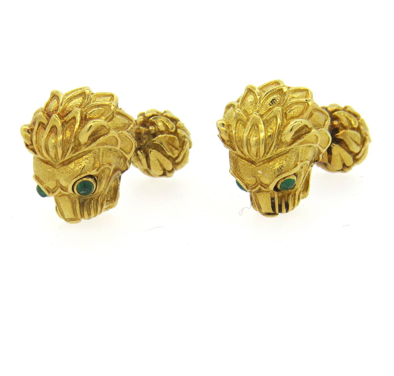A pair of 18k yellow gold cufflinks set with emerald cabochons 2.1mm in diameter.  Crafted by David Webb, the cufflinks measure 18mm x 15mm and weigh 32 grams.  Marked: Webb, 18k.