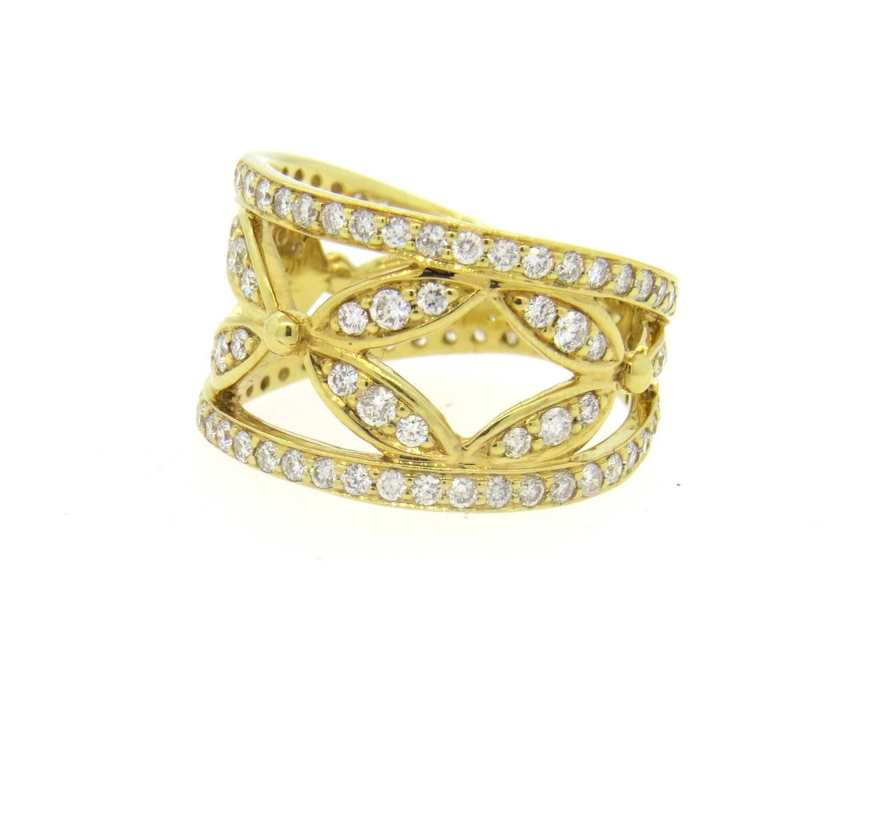 An 18k yellow gold ring set with 1.30cts of G/VS diamonds.  Crafted by Temple St. Clair, the ring is a size 6.5 and measures 12.5mm in width.  The weight of the ring is 6.4 grams.  Current Retail is $6500.  Marked: Temple St. Clair Hallmark, 750
