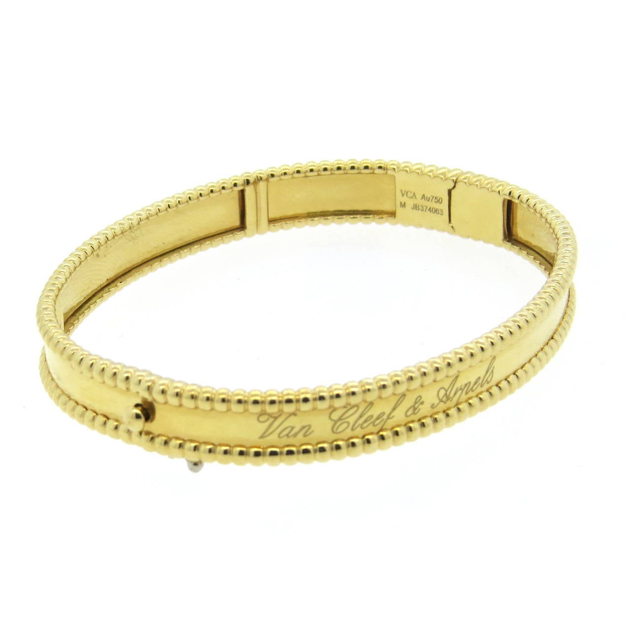 An 18k yellow gold bracelet from the Perlee Signature collection by Van Cleef & Arpels.  The bracelet comfortably fits up to a 6.75