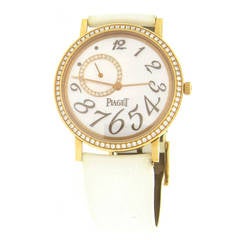 Piaget Lady's Yellow Gold Mecanique Mother-of-Pearl Diamond Dial Wristwatch