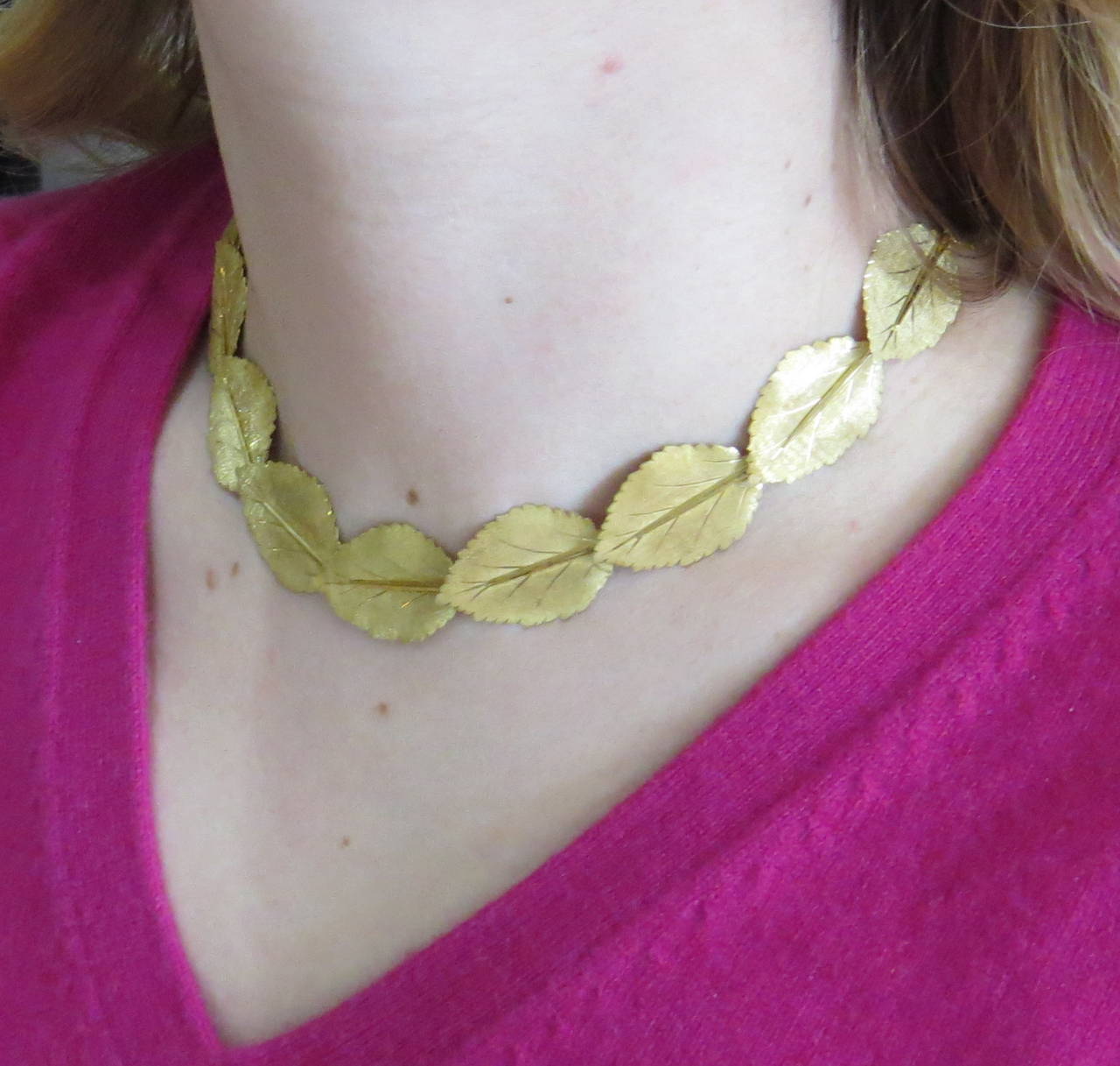 18k gold necklace by Buccellati, featuring leaf motifs. Necklace is 16