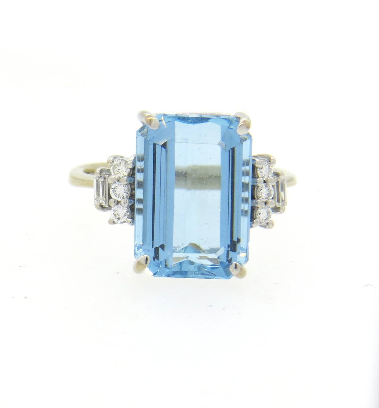 18k gold ring by H. Stern, featuring 13.1mm x 9.6mm x 6.5mm aquamarine, surrounded with round and baguette diamonds. Ring is a size 7. Marked 750 and with H Stern mark. Weight of the piece - 5.4 grams
Comes in H Stern box