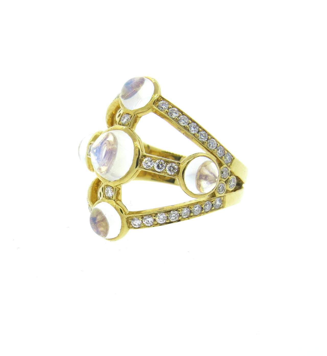 18k gold ring by Temple St. Clair, featuring 0.71ctw in G/Vs diamonds and moonstone cabochons. Ring is a size 6 1/2, ring top is 21mm at widest point. Marked with Temple hallmark and 750. Weight 9 grams.
Retails for $4500
