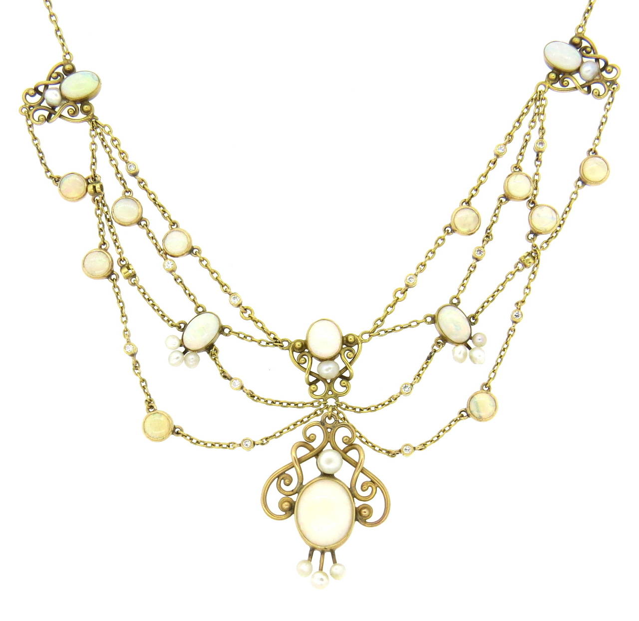 Antique 14k gold necklace, decorated with opals, pearls and diamonds. Necklace is 16