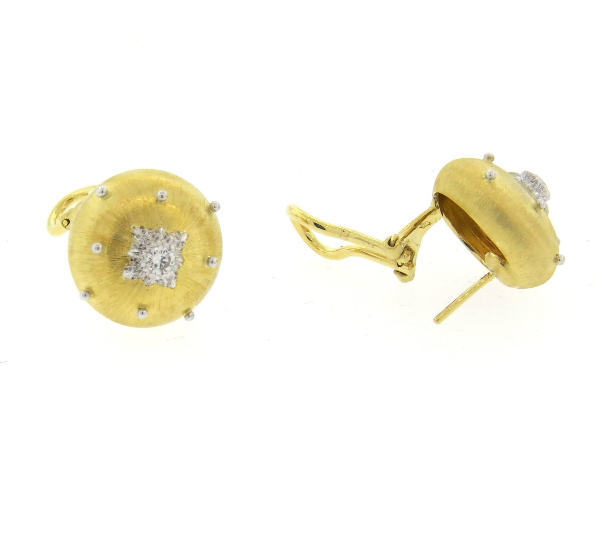 A pair of 18k yellow gold button earrings, crafted by Buccellati, set with 0.25ctw GH/VS diamonds.  Earrings are 16mm in diameter. Marked: Buccellati Italy 18k M6373. Weight - 12.5 grams 