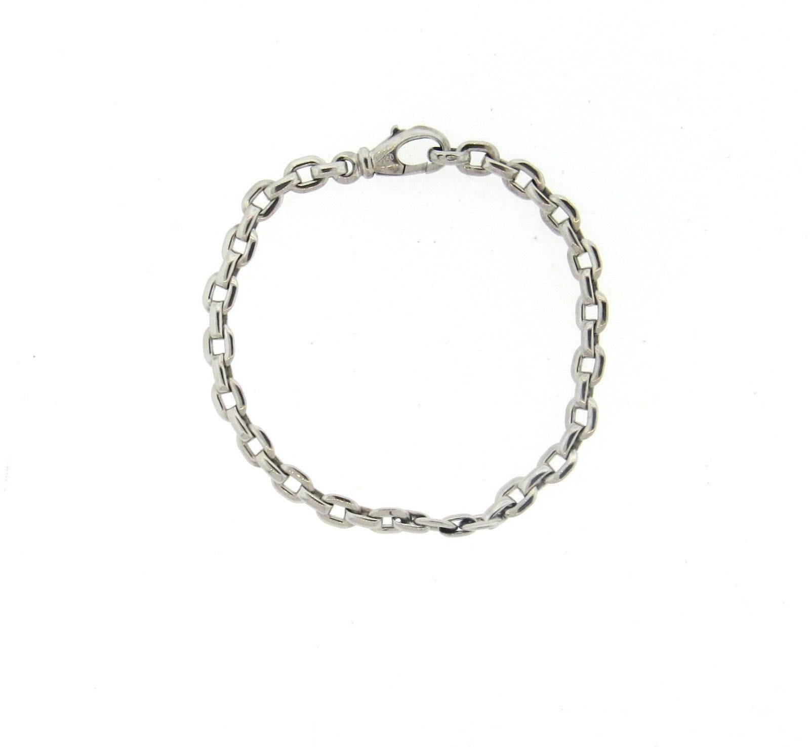An 18k white gold bracelet crafted by Cartier. The bracelet is 7 1/4