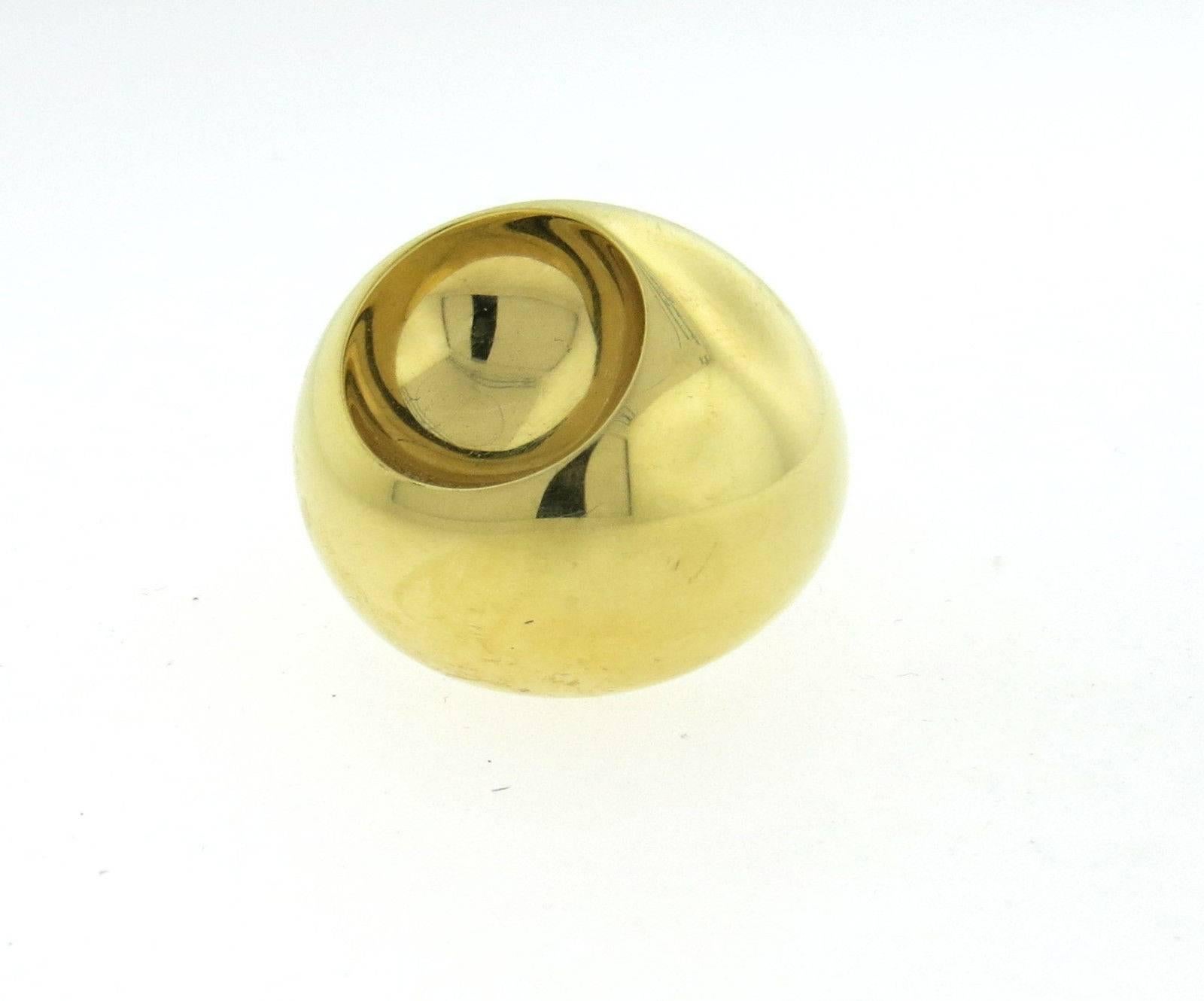 An 18k yellow gold dome ring.  Crafted by Georg Jensen, the ring is a size 6, ring top is 23mm x 27mm, sits approx. 15mm from the finger. Marked: GJ mark, 1509, 750.  The weight of the ring is 27.5 grams.