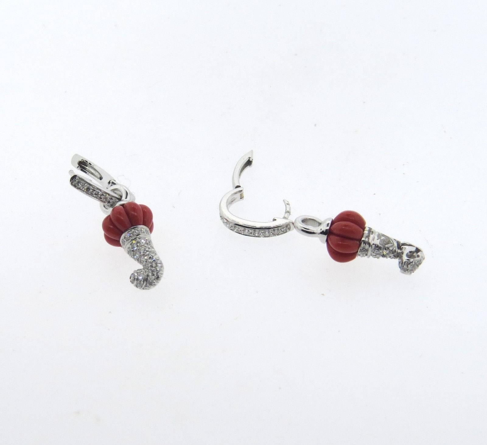 A pair of 18k white gold earrings set with carved coral and 0.80ctw of FG/VS diamonds.  Crafted by Chantecler, the earrings are 34mm long ( drops can be removed - earrings can be worn as hoops alone).  Marked: Chantecler, Italy, 18kt 750.  The