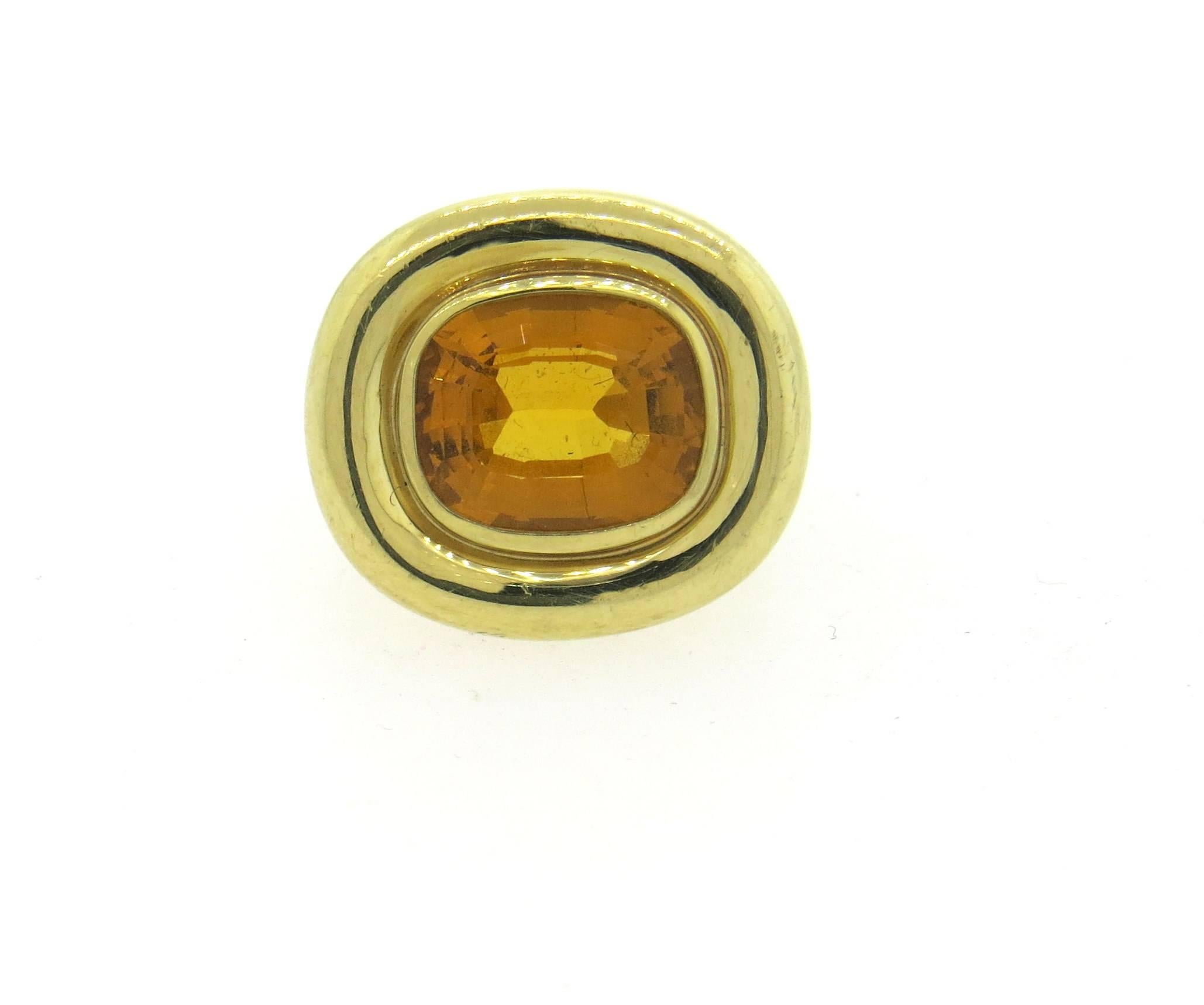 An 18k yellow gold ring, crafted by Paloma Picasso for Tiffany & Co, featuring approx. 4.5ct citrine. Ring size 5, ring top 18mm x 20mm . Marked: 1981, Paloma Picasso ,18k,Tiffany & Co. Weight of the piece - 15.8 grams