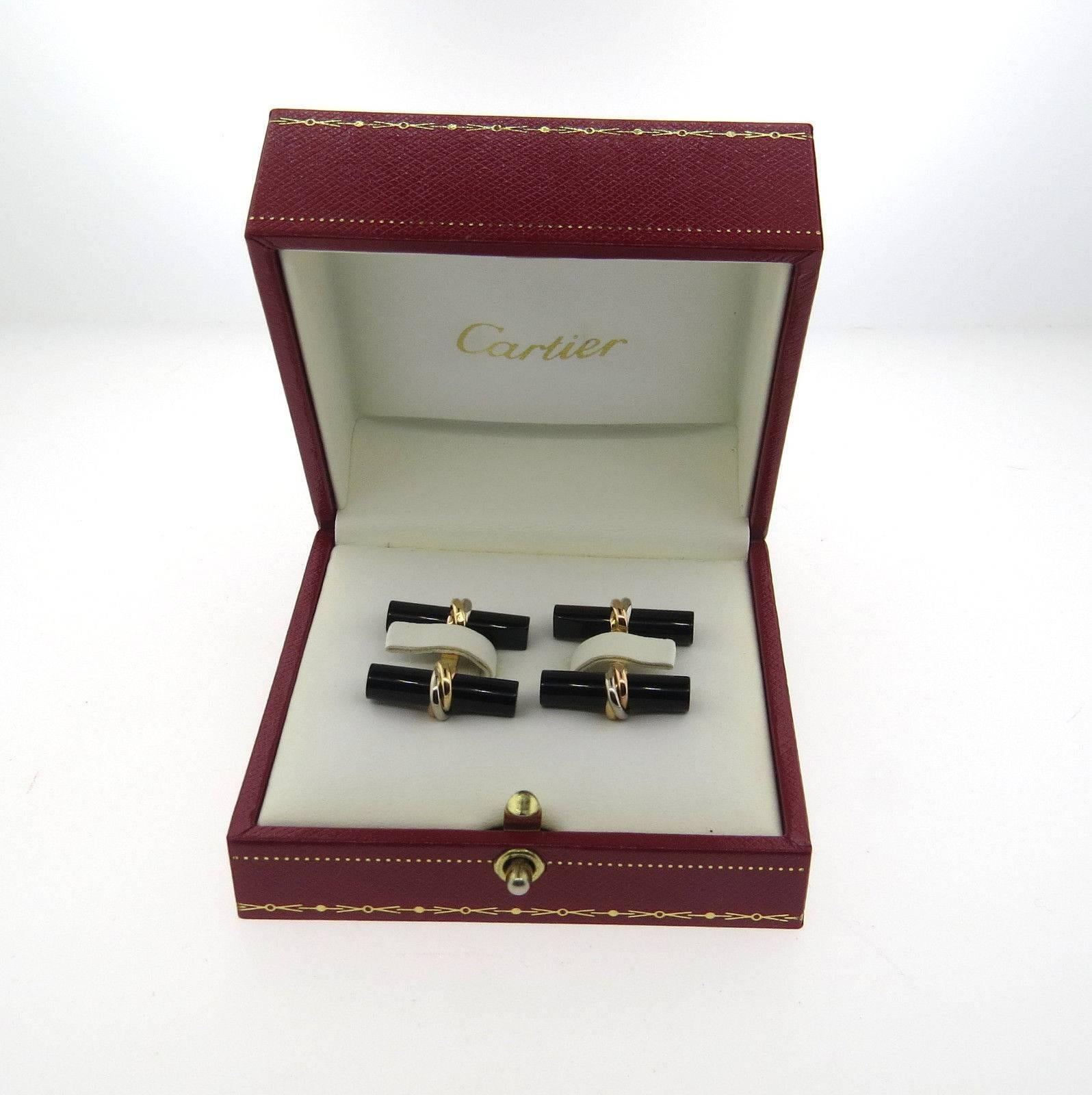 Cartier Trinity Onyx Tricolor Gold Cufflinks In Excellent Condition In Lambertville, NJ