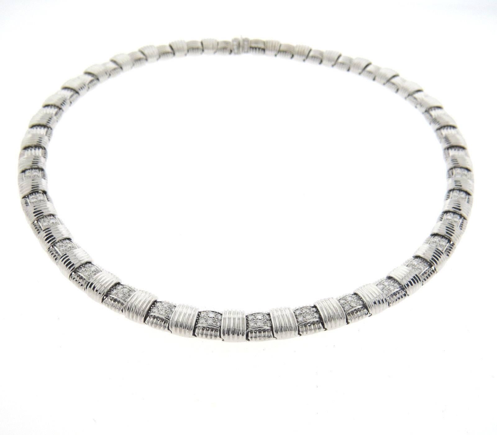 An 18k white gold necklace set with approximately 2.30ctw of G/VS diamonds.  Crafted by Roberto Coin for the Appassionata Collection, the necklace is  16 1/2