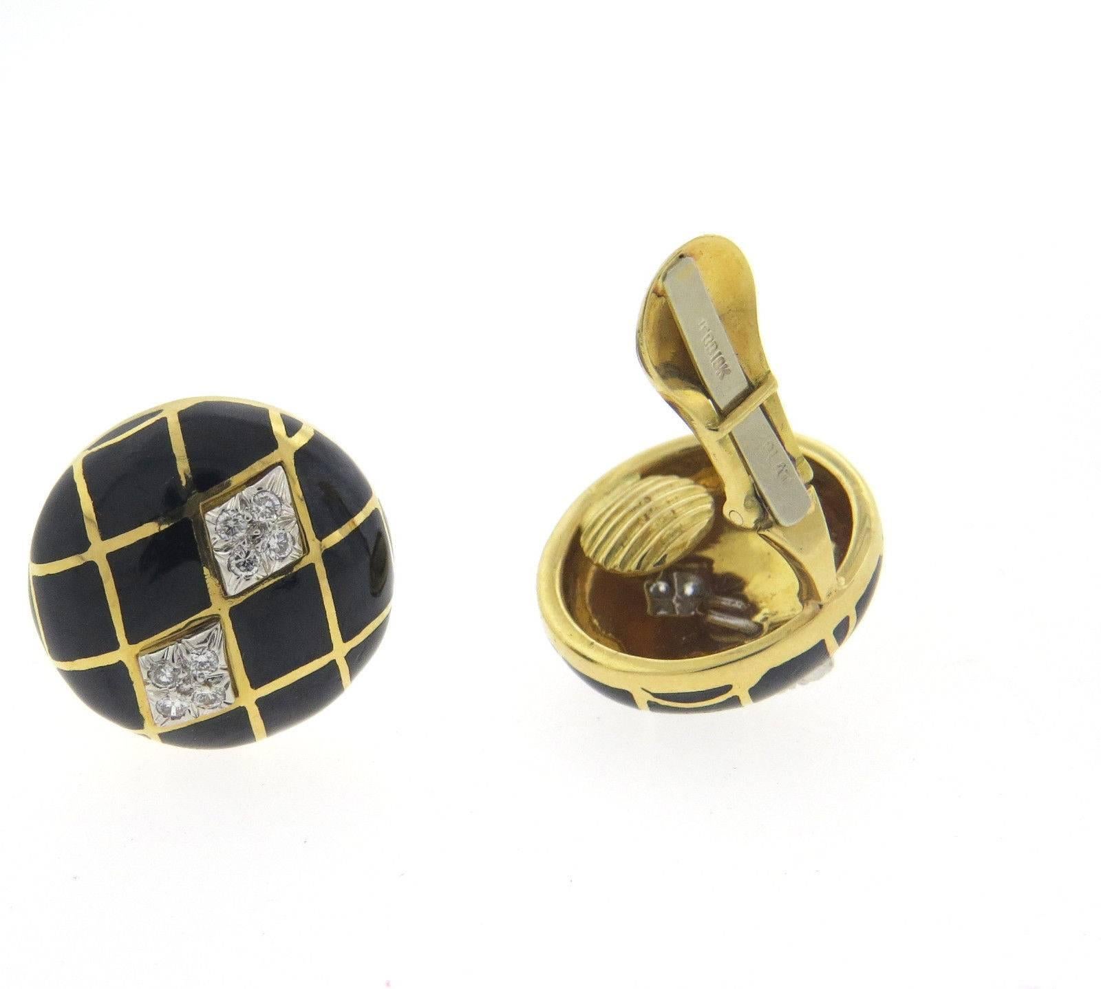 A pair of 18k yellow gold and platinum earrings adorned with black enamel and approximately 0.48ctw of H/VS diamonds.  Crafted by David Webb, the earrings measure mm in diameter and weigh 25.5 grams.  Marked: Webb, 18k plat 