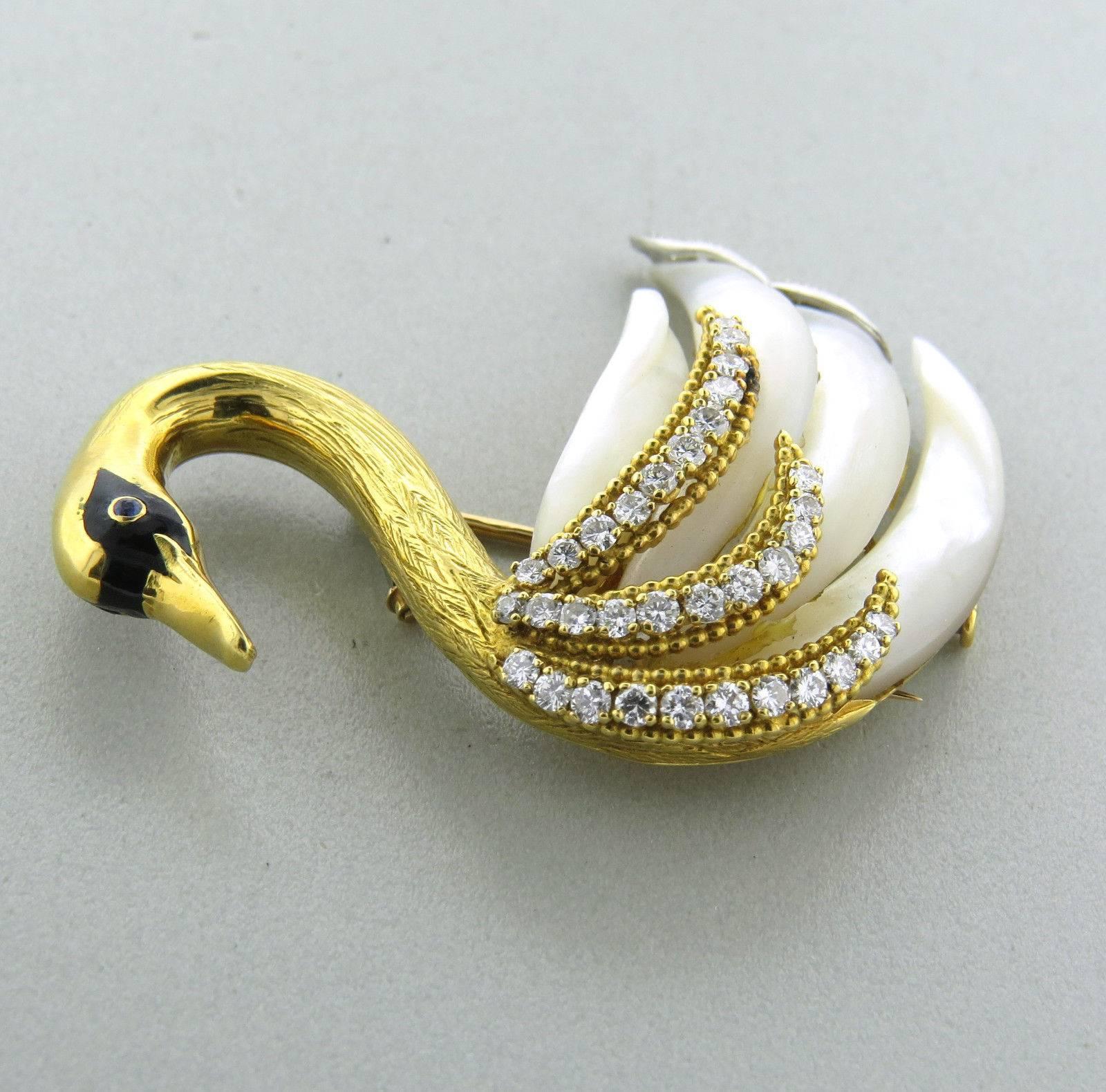 An 18k yellow gold brooch set with a sapphire, pearls and approximately 1.25ctw of G/VS diamonds. The brooch measures 53mm x 50mm and weighs 25.7 grams. Marked: Boucheron, 750, made in France, gold assay marks.