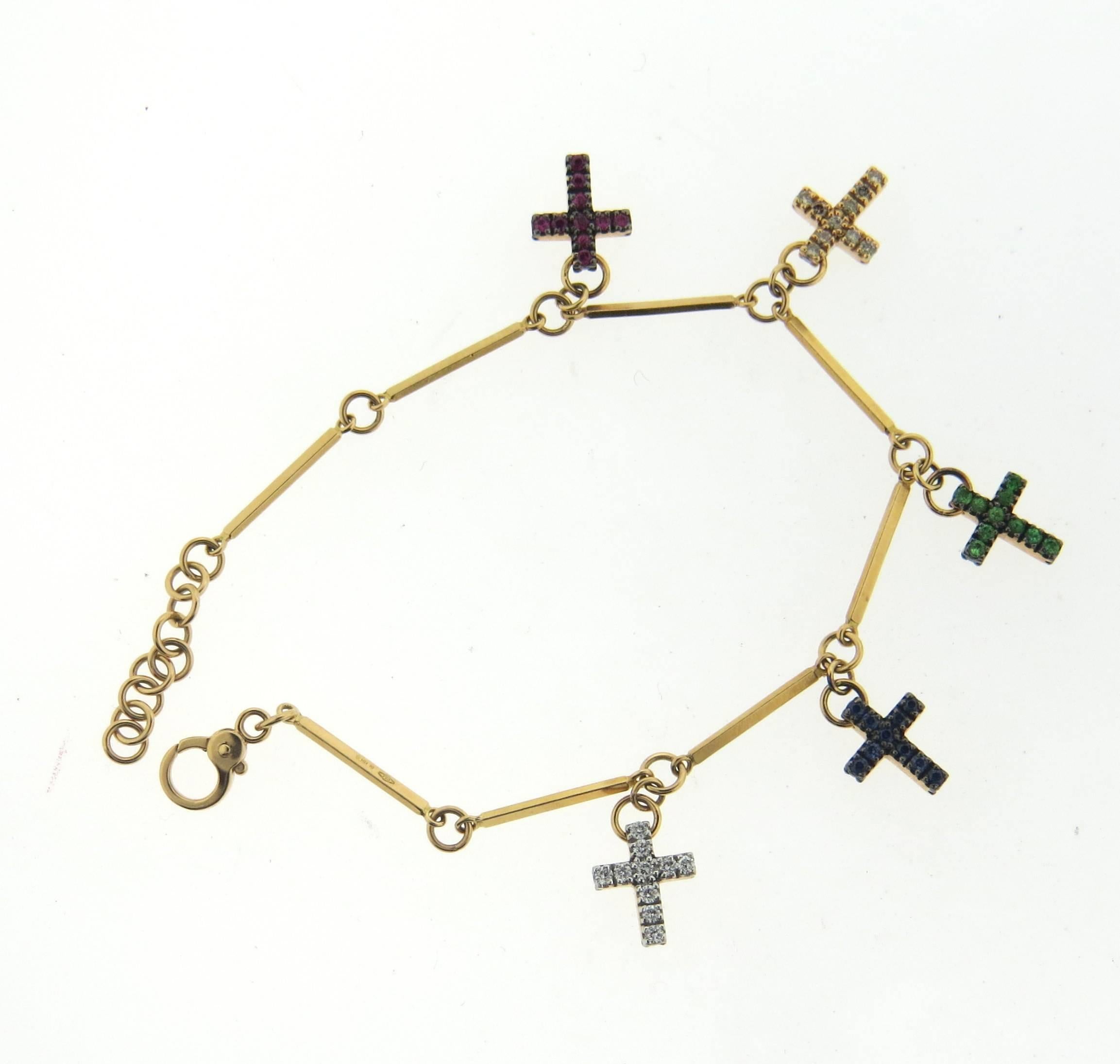 gold bracelet with cross charm
