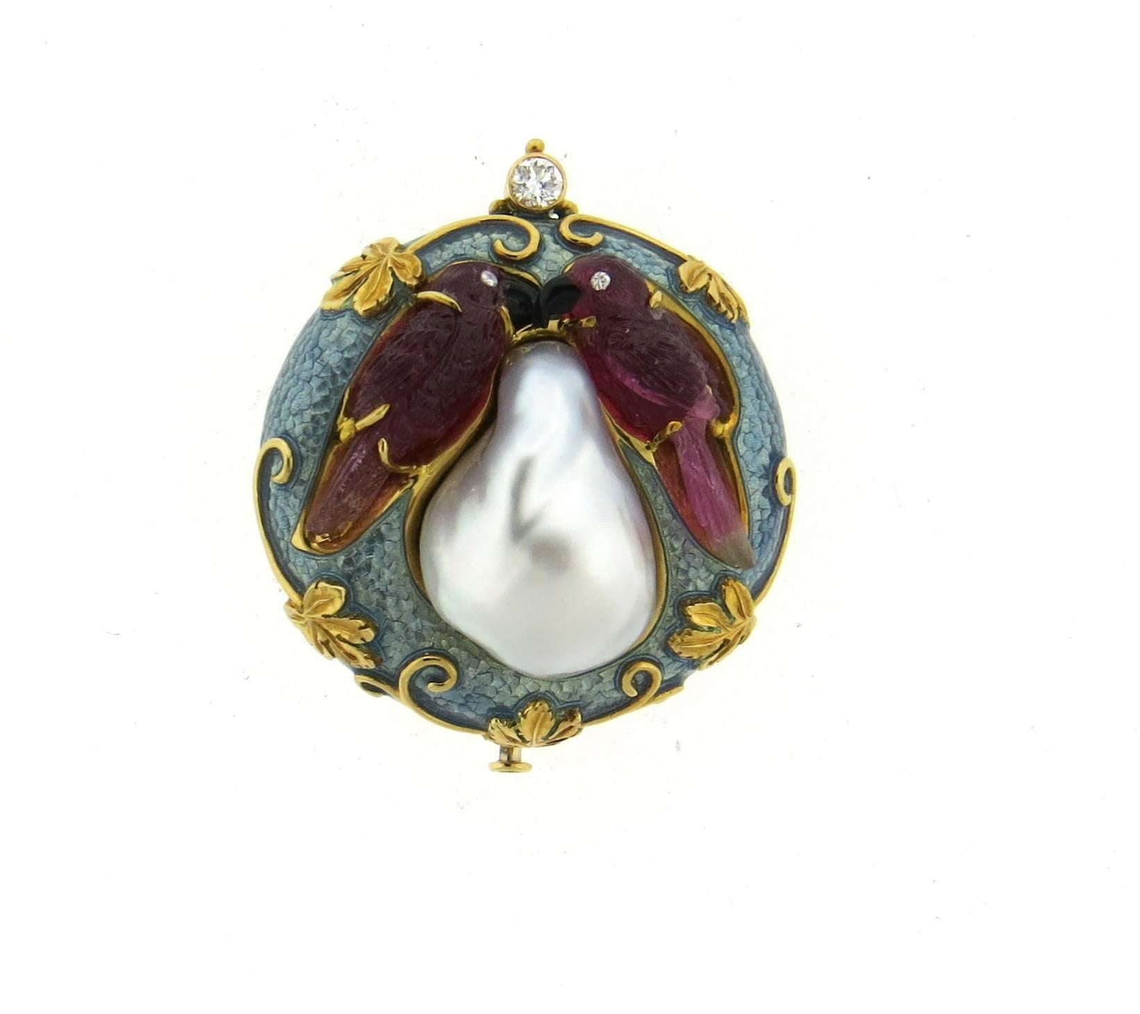Exquisite and rare 18k yellow gold brooch, crafted by Elizabeth Gage, decorated with carved gemstone birds, 23mm x 16mm baroque pearl, enamel and approximately 0.21ctw in diamonds.Brooch is 36mm x 40mm. Marked: Gage, English gold assay marks .