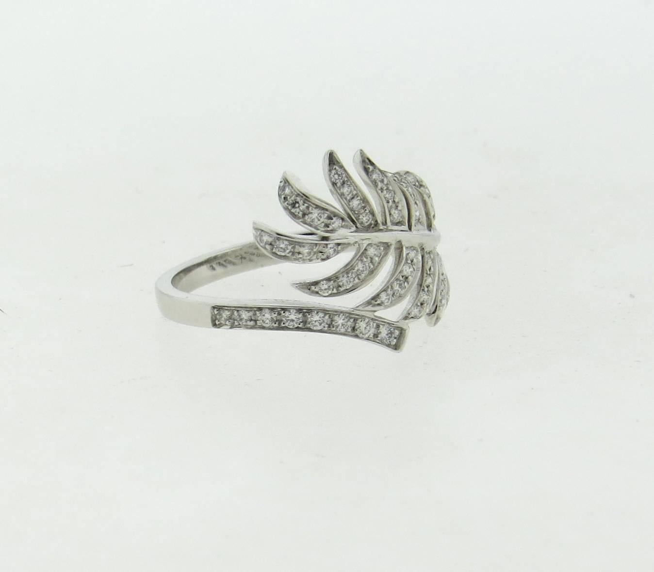 Delicate 18k white gold feather motif ring, crafted by Chanel for 1932 Plume de Chanel collection. Ring size  7 1/4, ring top is 14mm x 19mm, decorated with VVS/FG diamonds. Marked: Chanel. U27887, 55, au750, French mark. Weight of the piece - 3.6