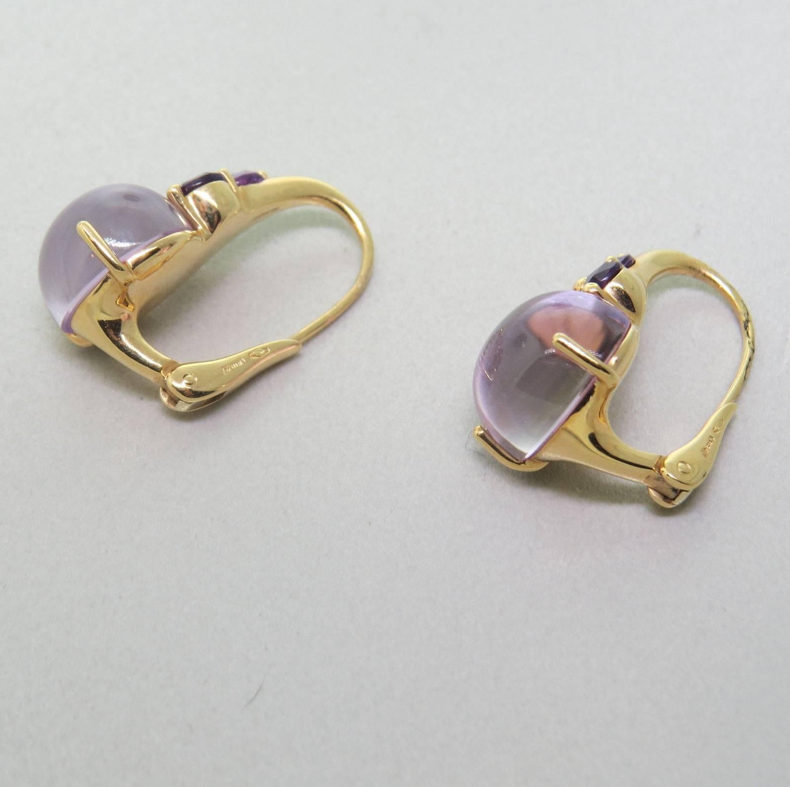 A pair of 18k rose gold Pomellato earrings, crafted by Luna collection, set with rose quartz and amethysts. Earrings are 26mm x 12.7mm . Weight - 13.7 grams 